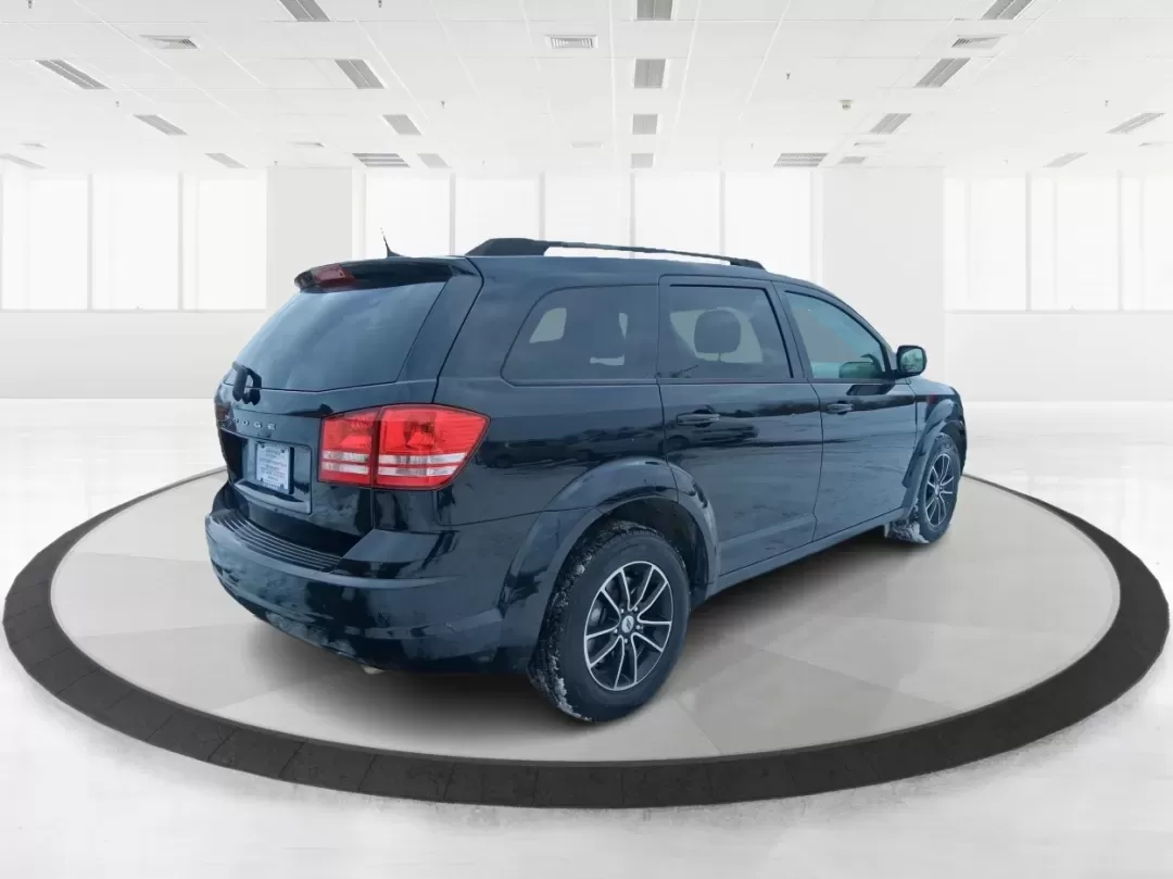 2018 Dodge Journey SE (3C4PDCAB9JT) with an Tigershark MultiAir 2.4L I-4 DOHC engine, 4A transmission, located at 8750 N County Rd 25A, Piqua, OH, 45356, (937) 908-9800, 40.164391, -84.232513 - Need a practical SUV that can handle school drop-offs, grocery runs, and weekend trips up I75 without blowing your budget? This 2018 Dodge Journey SE in Pitch Black Clearcoat is built for real life in West Central Ohio-roomy enough for growing families, comfortable for long commutes, and flexible fo - Photo#2