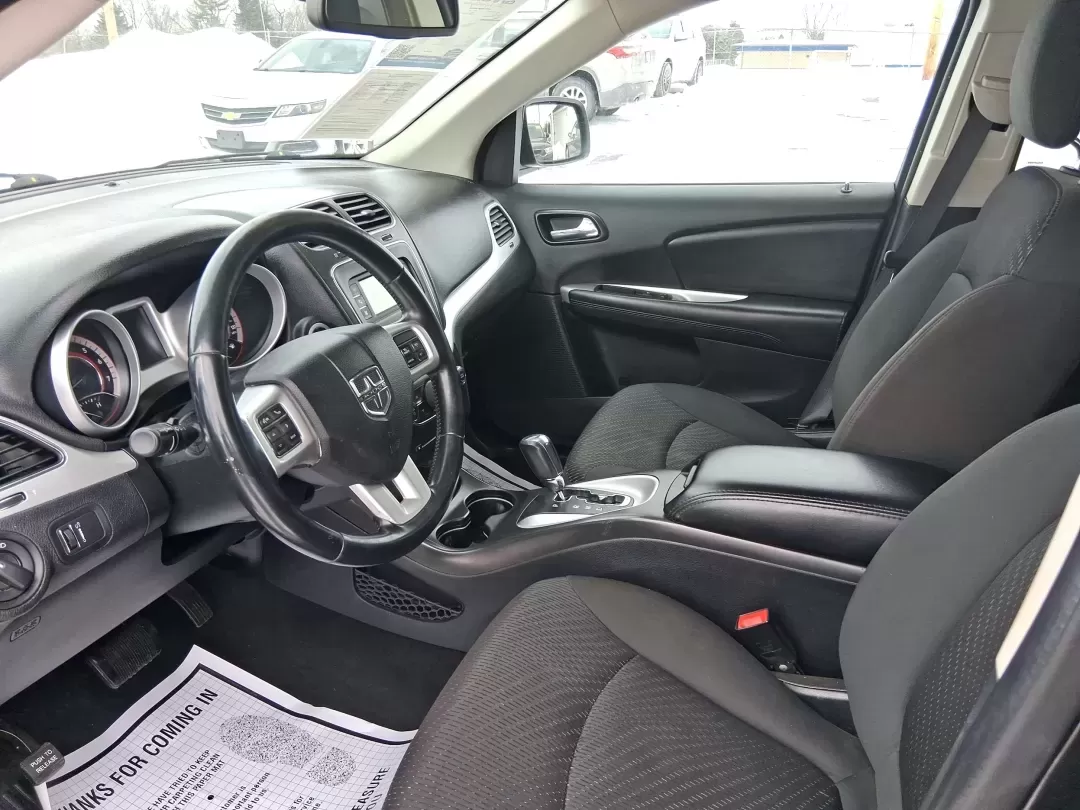 2018 Dodge Journey SE (3C4PDCAB9JT) with an Tigershark MultiAir 2.4L I-4 DOHC engine, 4A transmission, located at 8750 N County Rd 25A, Piqua, OH, 45356, (937) 908-9800, 40.164391, -84.232513 - Need a practical SUV that can handle school drop-offs, grocery runs, and weekend trips up I75 without blowing your budget? This 2018 Dodge Journey SE in Pitch Black Clearcoat is built for real life in West Central Ohio-roomy enough for growing families, comfortable for long commutes, and flexible fo - Photo#8