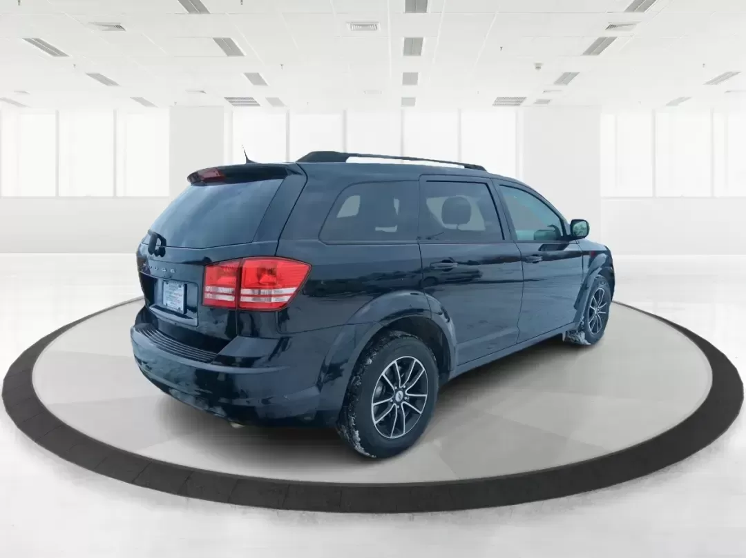 2018 Dodge Journey SE (3C4PDCAB9JT) with an Tigershark MultiAir 2.4L I-4 DOHC engine, 4A transmission, located at 880 E. National Road, Vandalia, OH, 45377, (937) 908-9800, 39.891918, -84.183594 - Need a practical SUV that can handle school drop-offs, grocery runs, and weekend trips up I75 without blowing your budget? This 2018 Dodge Journey SE in Pitch Black Clearcoat is built for real life in West Central Ohio-roomy enough for growing families, comfortable for long commutes, and flexible fo - Photo#2
