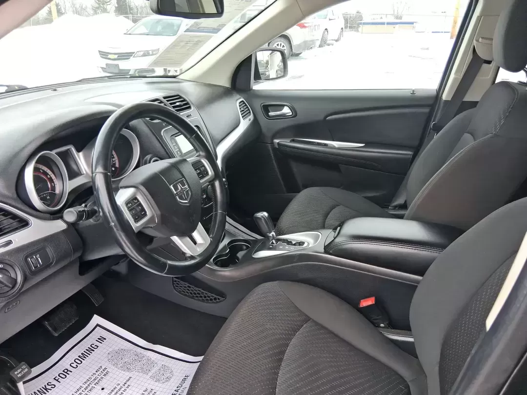 2018 Dodge Journey SE (3C4PDCAB9JT) with an Tigershark MultiAir 2.4L I-4 DOHC engine, 4A transmission, located at 880 E. National Road, Vandalia, OH, 45377, (937) 908-9800, 39.891918, -84.183594 - Need a practical SUV that can handle school drop-offs, grocery runs, and weekend trips up I75 without blowing your budget? This 2018 Dodge Journey SE in Pitch Black Clearcoat is built for real life in West Central Ohio-roomy enough for growing families, comfortable for long commutes, and flexible fo - Photo#8