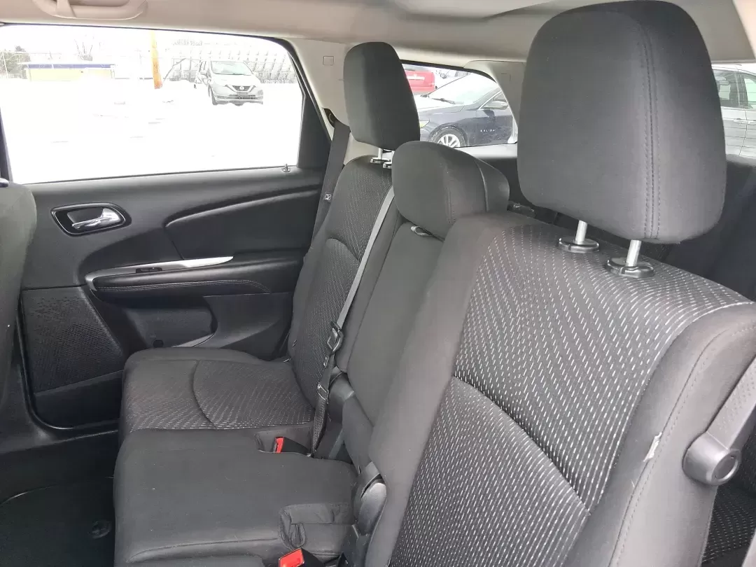 2018 Dodge Journey SE (3C4PDCAB9JT) with an Tigershark MultiAir 2.4L I-4 DOHC engine, 4A transmission, located at 880 E. National Road, Vandalia, OH, 45377, (937) 908-9800, 39.891918, -84.183594 - Need a practical SUV that can handle school drop-offs, grocery runs, and weekend trips up I75 without blowing your budget? This 2018 Dodge Journey SE in Pitch Black Clearcoat is built for real life in West Central Ohio-roomy enough for growing families, comfortable for long commutes, and flexible fo - Photo#9