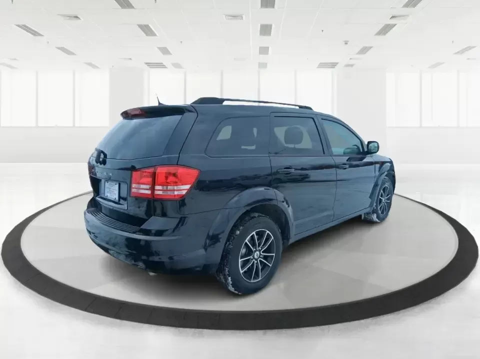 2018 Dodge Journey SE (3C4PDCAB9JT) with an Tigershark MultiAir 2.4L I-4 DOHC engine, 4A transmission, located at 880 E. National Road, Vandalia, OH, 45377, (937) 908-9800, 39.891918, -84.183594 - Need a practical SUV that can handle school drop-offs, grocery runs, and weekend trips up I75 without blowing your budget? This 2018 Dodge Journey SE in Pitch Black Clearcoat is built for real life in West Central Ohio-roomy enough for growing families, comfortable for long commutes, and flexible fo - Photo#2