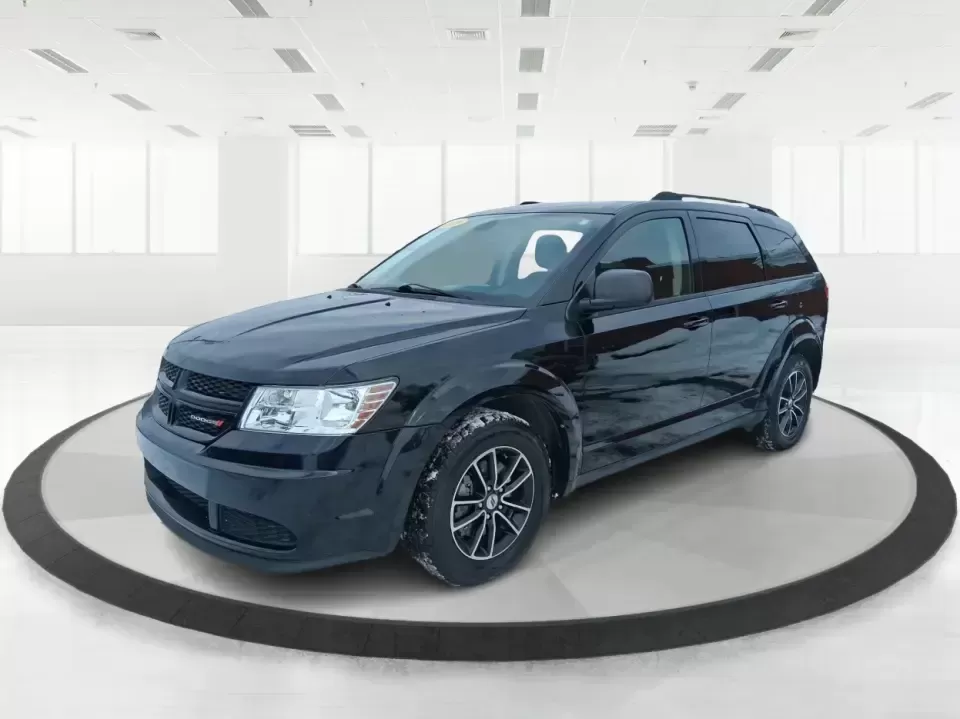 2018 Dodge Journey SE (3C4PDCAB9JT) with an Tigershark MultiAir 2.4L I-4 DOHC engine, 4A transmission, located at 880 E. National Road, Vandalia, OH, 45377, (937) 908-9800, 39.891918, -84.183594 - Need a practical SUV that can handle school drop-offs, grocery runs, and weekend trips up I75 without blowing your budget? This 2018 Dodge Journey SE in Pitch Black Clearcoat is built for real life in West Central Ohio-roomy enough for growing families, comfortable for long commutes, and flexible fo - Photo#7