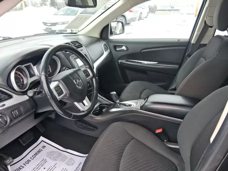 2018 Dodge Journey SE (3C4PDCAB9JT) with an Tigershark MultiAir 2.4L I-4 DOHC engine, 4A transmission, located at 880 E. National Road, Vandalia, OH, 45377, (937) 908-9800, 39.891918, -84.183594 - Need a practical SUV that can handle school drop-offs, grocery runs, and weekend trips up I75 without blowing your budget? This 2018 Dodge Journey SE in Pitch Black Clearcoat is built for real life in West Central Ohio-roomy enough for growing families, comfortable for long commutes, and flexible fo - Photo#8