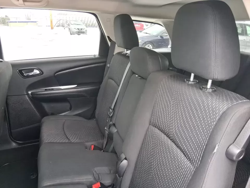 2018 Dodge Journey SE (3C4PDCAB9JT) with an Tigershark MultiAir 2.4L I-4 DOHC engine, 4A transmission, located at 880 E. National Road, Vandalia, OH, 45377, (937) 908-9800, 39.891918, -84.183594 - Need a practical SUV that can handle school drop-offs, grocery runs, and weekend trips up I75 without blowing your budget? This 2018 Dodge Journey SE in Pitch Black Clearcoat is built for real life in West Central Ohio-roomy enough for growing families, comfortable for long commutes, and flexible fo - Photo#9