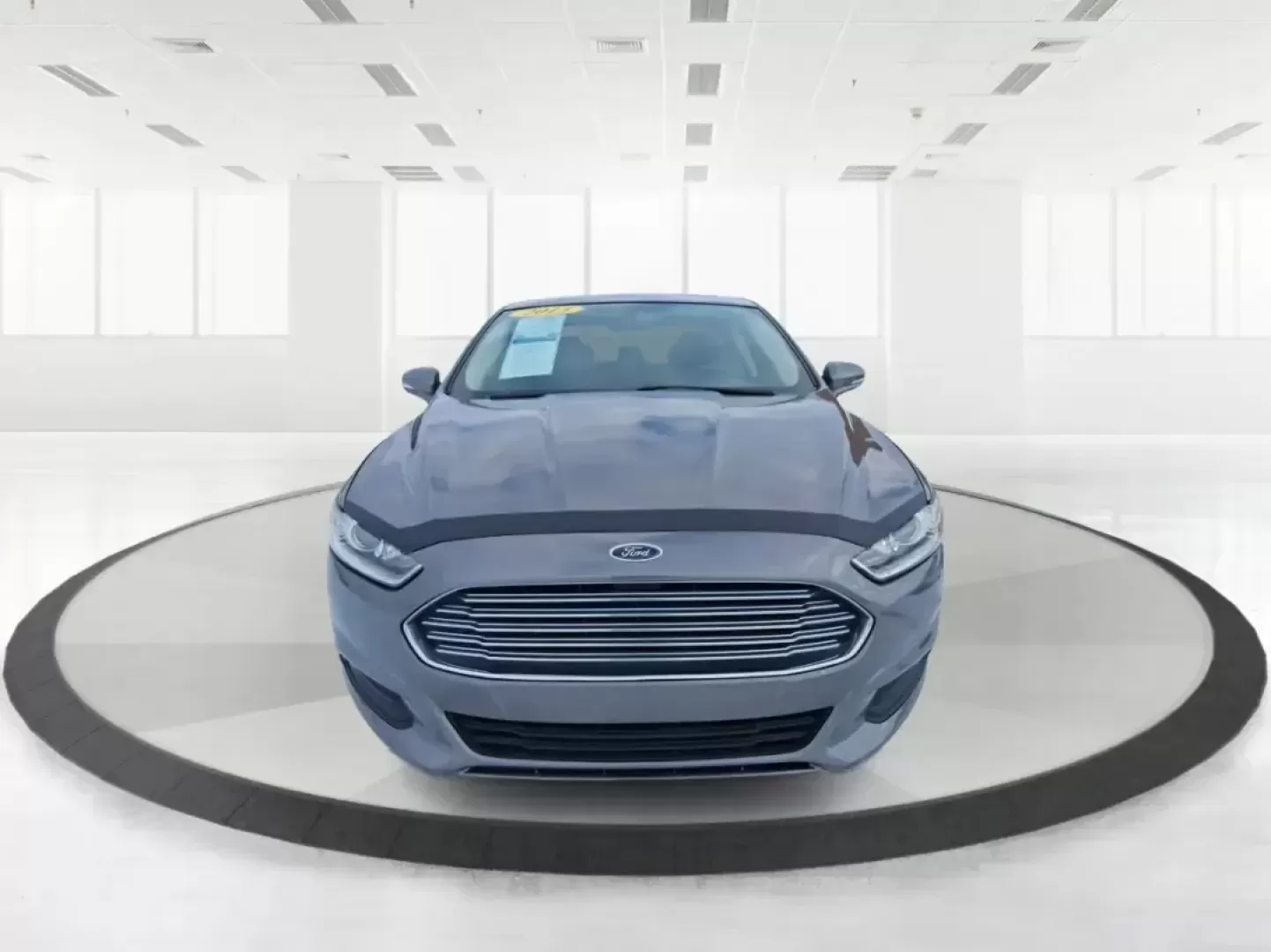 2013 Ford Fusion SE (3FA6P0H72DR) with an 2.5L L4 DOHC 16V engine, Automatic transmission, located at 1951 S Dayton Lakeview Rd., New Carlisle, OH, 45344, (937) 908-9800, 39.890999, -84.050255 - Need a dependable commuter that can handle daily drives to Wright-Patterson AFB, weekend errands around Beavercreek, and the occasional road trip down I-675 without draining your budget? This 2013 Ford Fusion SE in Sterling Gray is a smart, comfortable sedan built for real life-great for long commut - Photo#7