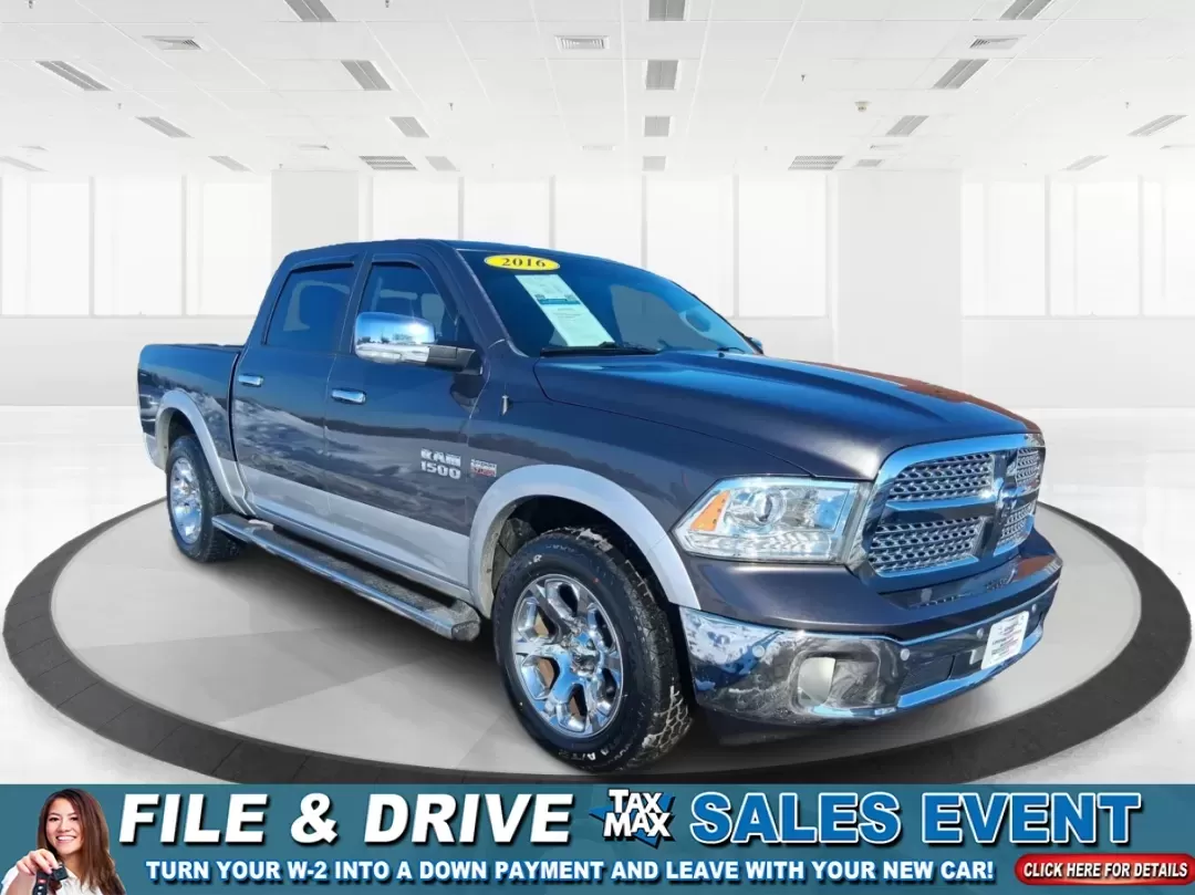 2016 Ram 1500 Laramie (1C6RR7NT1GS) with an 5.7L V8 OHV 16V engine, 6A transmission, located at 1099 N County Rd 25A , Troy, OH, 45373, (937) 908-9800, 40.057079, -84.212883 - Built for Ohio backroads, weekend lake runs, and the kind of workday that doesn't stop when the weather turns, this 2016 Ram 1500 Laramie Crew Cab 4WD is the truck that fits real life in Troy. Whether you're towing a trailer out toward the Miami County Fairgrounds, hauling gear for a Saturday at Tre - Photo#0