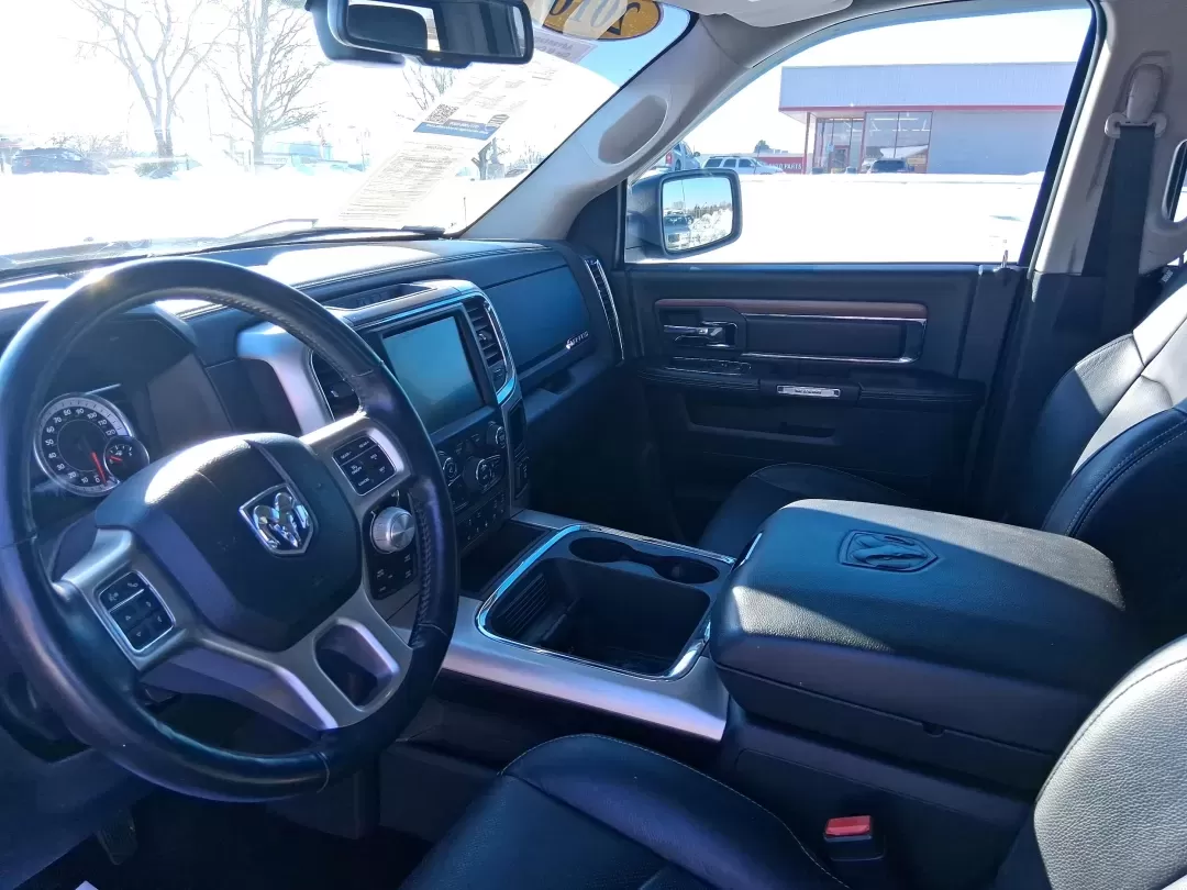 2016 Ram 1500 Laramie (1C6RR7NT1GS) with an 5.7L V8 OHV 16V engine, 6A transmission, located at 1099 N County Rd 25A , Troy, OH, 45373, (937) 908-9800, 40.057079, -84.212883 - Built for Ohio backroads, weekend lake runs, and the kind of workday that doesn't stop when the weather turns, this 2016 Ram 1500 Laramie Crew Cab 4WD is the truck that fits real life in Troy. Whether you're towing a trailer out toward the Miami County Fairgrounds, hauling gear for a Saturday at Tre - Photo#9