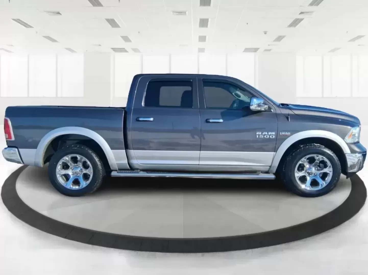 2016 Ram 1500 Laramie (1C6RR7NT1GS) with an 5.7L V8 OHV 16V engine, 6A transmission, located at 1951 S Dayton Lakeview Rd., New Carlisle, OH, 45344, (937) 908-9800, 39.890999, -84.050255 - Built for Ohio backroads, weekend lake runs, and the kind of workday that doesn't stop when the weather turns, this 2016 Ram 1500 Laramie Crew Cab 4WD is the truck that fits real life in Troy. Whether you're towing a trailer out toward the Miami County Fairgrounds, hauling gear for a Saturday at Tre - Photo#1