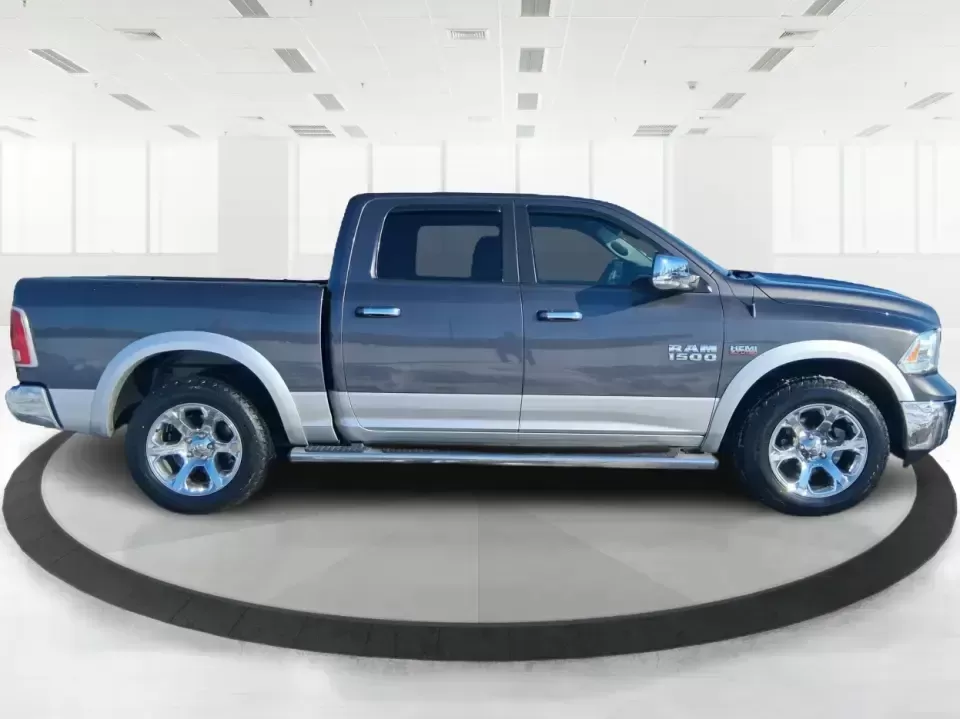 2016 Ram 1500 Laramie (1C6RR7NT1GS) with an 5.7L V8 OHV 16V engine, 6A transmission, located at 1230 East Main St, Xenia, OH, 45385, (937) 908-9800, 39.688026, -83.910172 - Built for Ohio backroads, weekend lake runs, and the kind of workday that doesn't stop when the weather turns, this 2016 Ram 1500 Laramie Crew Cab 4WD is the truck that fits real life in Troy. Whether you're towing a trailer out toward the Miami County Fairgrounds, hauling gear for a Saturday at Tre - Photo#1