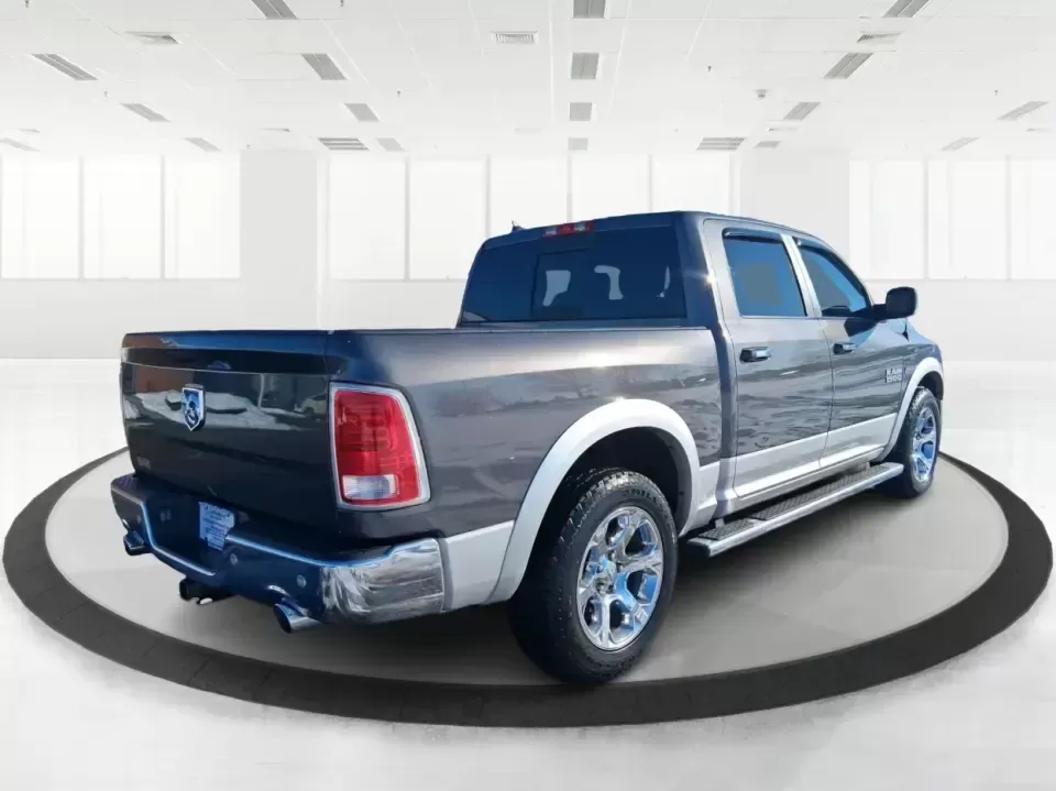 2016 Ram 1500 Laramie (1C6RR7NT1GS) with an 5.7L V8 OHV 16V engine, 6A transmission, located at 1230 East Main St, Xenia, OH, 45385, (937) 908-9800, 39.688026, -83.910172 - Built for Ohio backroads, weekend lake runs, and the kind of workday that doesn't stop when the weather turns, this 2016 Ram 1500 Laramie Crew Cab 4WD is the truck that fits real life in Troy. Whether you're towing a trailer out toward the Miami County Fairgrounds, hauling gear for a Saturday at Tre - Photo#2