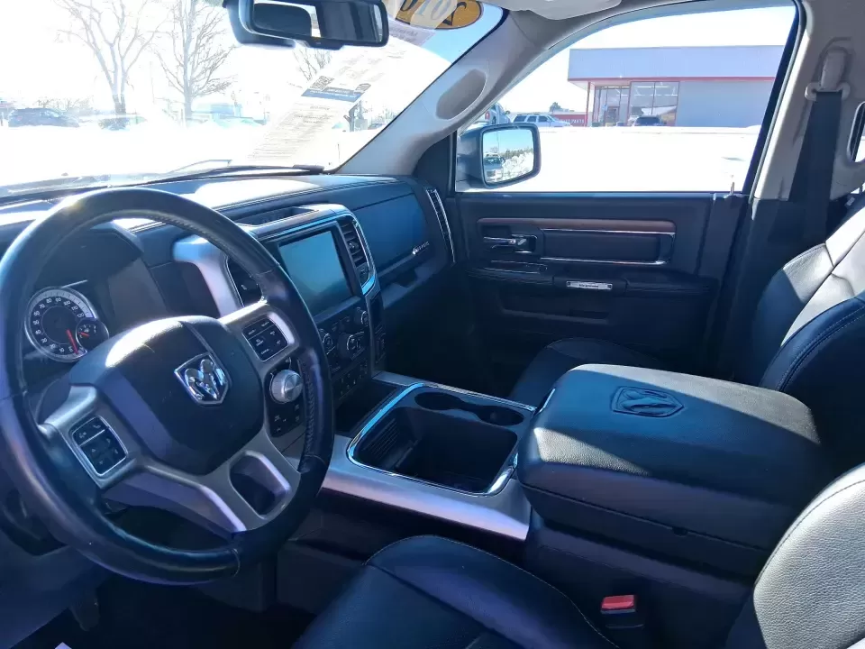 2016 Ram 1500 Laramie (1C6RR7NT1GS) with an 5.7L V8 OHV 16V engine, 6A transmission, located at 1230 East Main St, Xenia, OH, 45385, (937) 908-9800, 39.688026, -83.910172 - Built for Ohio backroads, weekend lake runs, and the kind of workday that doesn't stop when the weather turns, this 2016 Ram 1500 Laramie Crew Cab 4WD is the truck that fits real life in Troy. Whether you're towing a trailer out toward the Miami County Fairgrounds, hauling gear for a Saturday at Tre - Photo#9