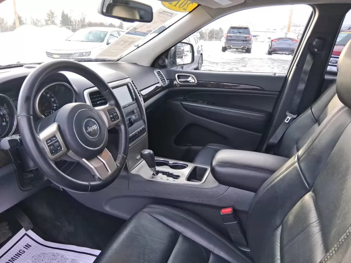 2012 Jeep Grand Cherokee Laredo (1C4RJFAG1CC) with an Other engine, located at 1099 N County Rd 25A , Troy, OH, 45373, (937) 908-9800, 40.057079, -84.212883 - Picture your next weekend escape: loading up the family, pointing the hood toward John A. Wannemacher Nature Reserve, and cruising I75 with confidence no matter what Ohio weather throws your way. This 2012 Jeep Grand Cherokee Laredo is built for real life in Troy-school runs, long commutes to Dayton - Photo#9