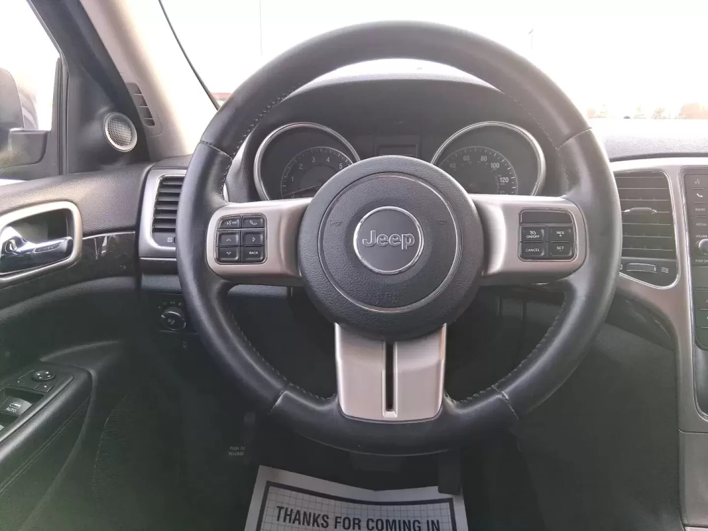 2012 Jeep Grand Cherokee Laredo (1C4RJFAG1CC) with an Other engine, located at 1099 N County Rd 25A , Troy, OH, 45373, (937) 908-9800, 40.057079, -84.212883 - Picture your next weekend escape: loading up the family, pointing the hood toward John A. Wannemacher Nature Reserve, and cruising I75 with confidence no matter what Ohio weather throws your way. This 2012 Jeep Grand Cherokee Laredo is built for real life in Troy-school runs, long commutes to Dayton - Photo#17