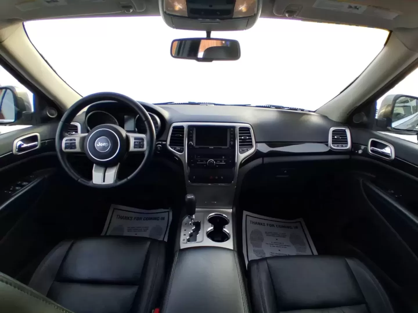 2012 Jeep Grand Cherokee Laredo (1C4RJFAG1CC) with an Other engine, located at 1099 N County Rd 25A , Troy, OH, 45373, (937) 908-9800, 40.057079, -84.212883 - Picture your next weekend escape: loading up the family, pointing the hood toward John A. Wannemacher Nature Reserve, and cruising I75 with confidence no matter what Ohio weather throws your way. This 2012 Jeep Grand Cherokee Laredo is built for real life in Troy-school runs, long commutes to Dayton - Photo#22