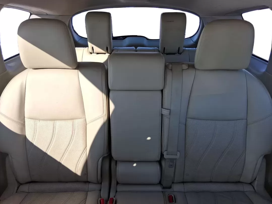 2013 Infiniti JX35 Base (5N1AL0MM9DC) with an 3.5L V6 DOHC 24V engine, Continuously Variable Transmission transmission, located at 1951 S Dayton Lakeview Rd., New Carlisle, OH, 45344, (937) 908-9800, 39.890999, -84.050255 - Need a comfortable, upscale SUV that can handle school drop-offs, I70 commutes, and weekend getaways without blowing the budget? This 2013 INFINITI JX35 Base in rich maroon delivers three-row versatility, premium comfort, and confidence-building safety features-an ideal fit for growing families, bus - Photo#12