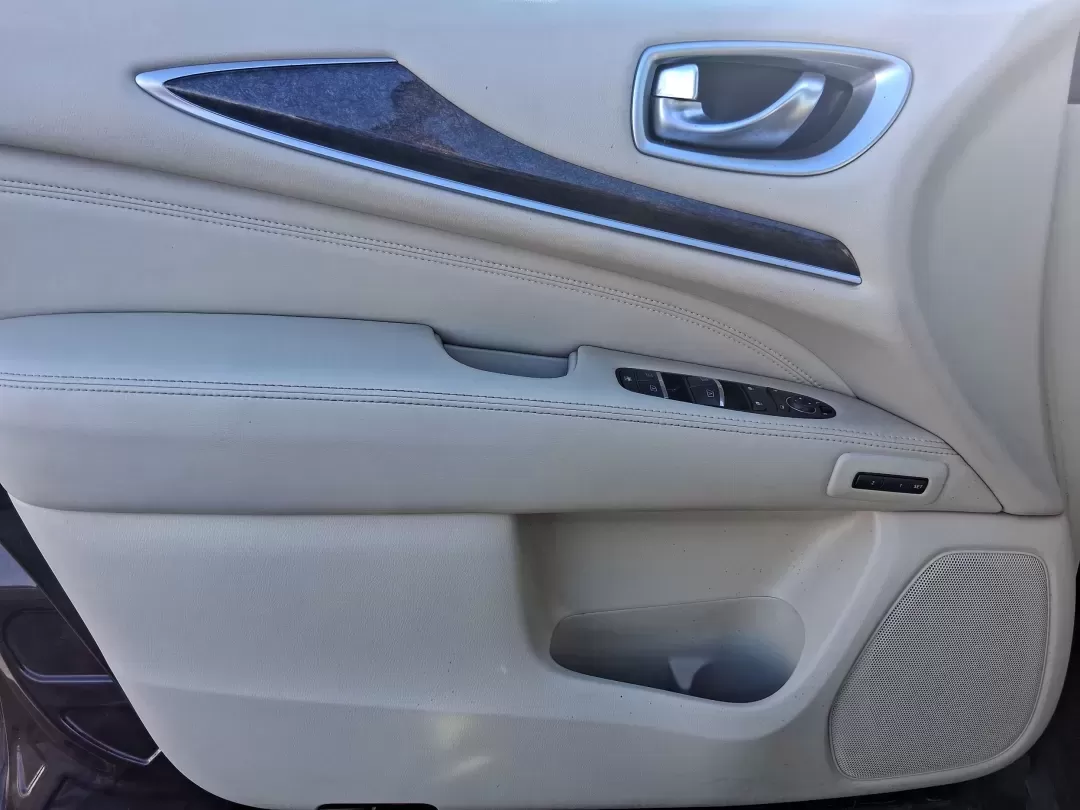 2013 Infiniti JX35 Base (5N1AL0MM9DC) with an 3.5L V6 DOHC 24V engine, Continuously Variable Transmission transmission, located at 1951 S Dayton Lakeview Rd., New Carlisle, OH, 45344, (937) 908-9800, 39.890999, -84.050255 - Need a comfortable, upscale SUV that can handle school drop-offs, I70 commutes, and weekend getaways without blowing the budget? This 2013 INFINITI JX35 Base in rich maroon delivers three-row versatility, premium comfort, and confidence-building safety features-an ideal fit for growing families, bus - Photo#16