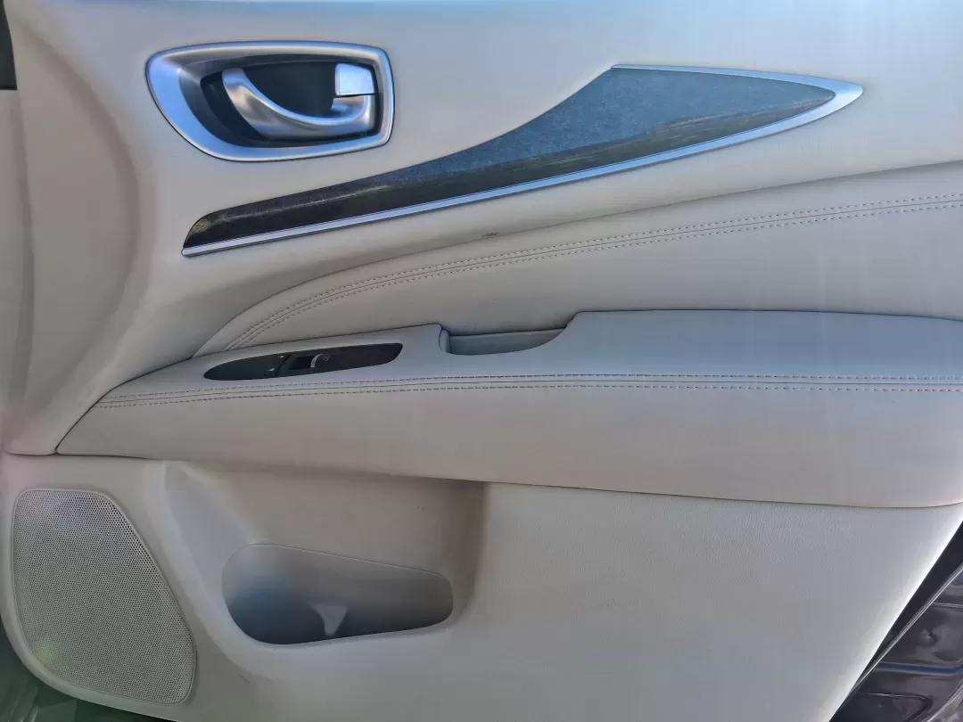 2013 Infiniti JX35 Base (5N1AL0MM9DC) with an 3.5L V6 DOHC 24V engine, Continuously Variable Transmission transmission, located at 1951 S Dayton Lakeview Rd., New Carlisle, OH, 45344, (937) 908-9800, 39.890999, -84.050255 - Need a comfortable, upscale SUV that can handle school drop-offs, I70 commutes, and weekend getaways without blowing the budget? This 2013 INFINITI JX35 Base in rich maroon delivers three-row versatility, premium comfort, and confidence-building safety features-an ideal fit for growing families, bus - Photo#17