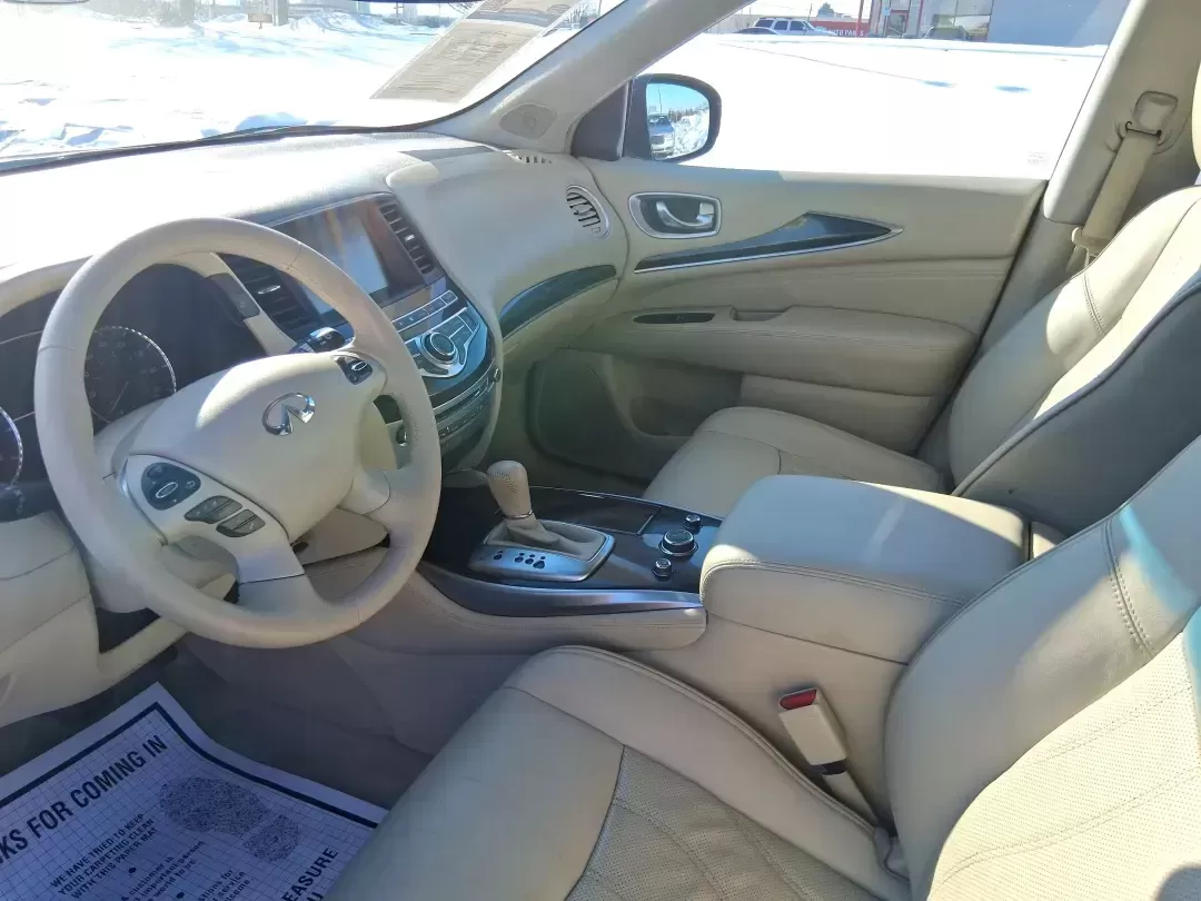 2013 Infiniti JX35 Base (5N1AL0MM9DC) with an 3.5L V6 DOHC 24V engine, Continuously Variable Transmission transmission, located at 1184 Kauffman Ave, Fairborn, OH, 45324, (937) 908-9800, 39.807072, -84.030914 - Need a comfortable, upscale SUV that can handle school drop-offs, I70 commutes, and weekend getaways without blowing the budget? This 2013 INFINITI JX35 Base in rich maroon delivers three-row versatility, premium comfort, and confidence-building safety features-an ideal fit for growing families, bus - Photo#7