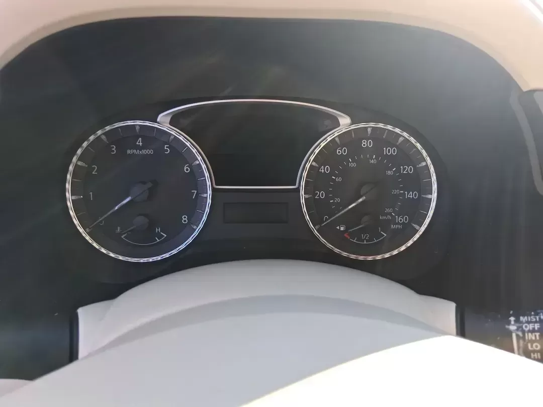 2013 Infiniti JX35 Base (5N1AL0MM9DC) with an 3.5L V6 DOHC 24V engine, Continuously Variable Transmission transmission, located at 1184 Kauffman Ave, Fairborn, OH, 45324, (937) 908-9800, 39.807072, -84.030914 - Need a comfortable, upscale SUV that can handle school drop-offs, I70 commutes, and weekend getaways without blowing the budget? This 2013 INFINITI JX35 Base in rich maroon delivers three-row versatility, premium comfort, and confidence-building safety features-an ideal fit for growing families, bus - Photo#13