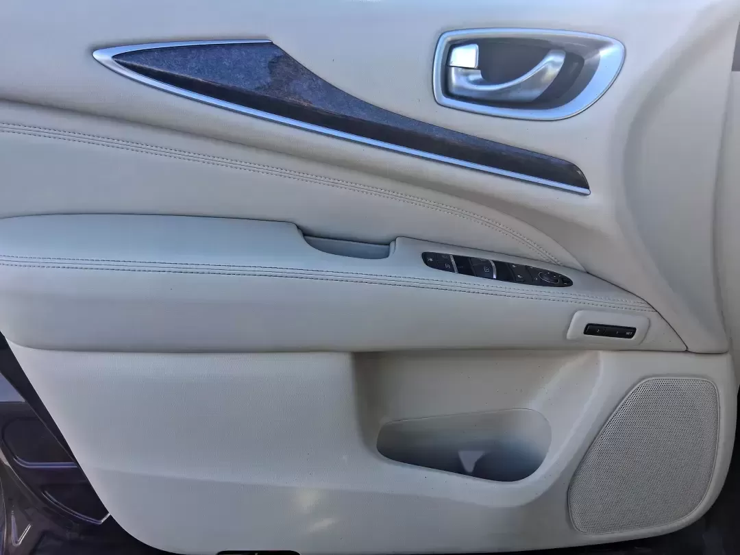 2013 Infiniti JX35 Base (5N1AL0MM9DC) with an 3.5L V6 DOHC 24V engine, Continuously Variable Transmission transmission, located at 1184 Kauffman Ave, Fairborn, OH, 45324, (937) 908-9800, 39.807072, -84.030914 - Need a comfortable, upscale SUV that can handle school drop-offs, I70 commutes, and weekend getaways without blowing the budget? This 2013 INFINITI JX35 Base in rich maroon delivers three-row versatility, premium comfort, and confidence-building safety features-an ideal fit for growing families, bus - Photo#16