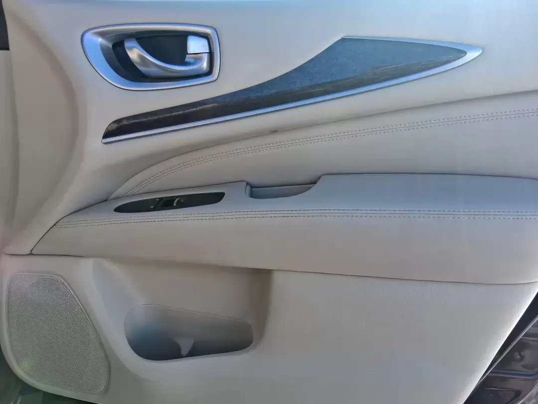 2013 Infiniti JX35 Base (5N1AL0MM9DC) with an 3.5L V6 DOHC 24V engine, Continuously Variable Transmission transmission, located at 1184 Kauffman Ave, Fairborn, OH, 45324, (937) 908-9800, 39.807072, -84.030914 - Need a comfortable, upscale SUV that can handle school drop-offs, I70 commutes, and weekend getaways without blowing the budget? This 2013 INFINITI JX35 Base in rich maroon delivers three-row versatility, premium comfort, and confidence-building safety features-an ideal fit for growing families, bus - Photo#17