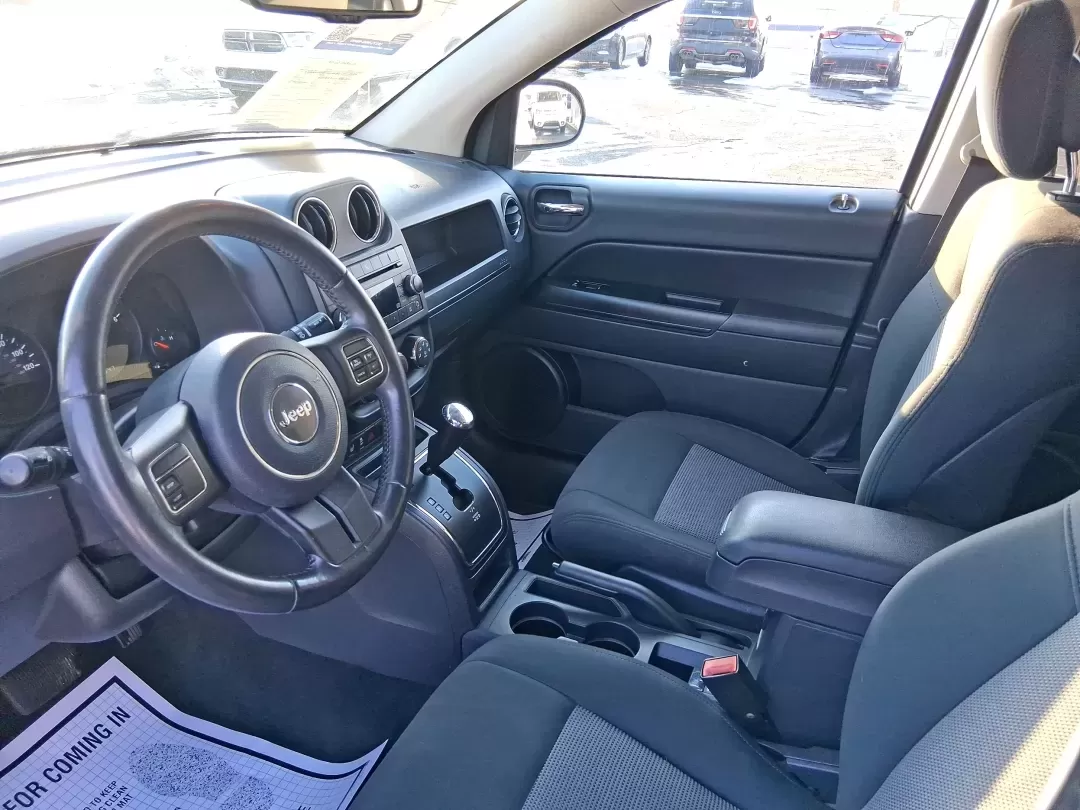 2012 Jeep Compass Latitude (1C4NJDEB4CD) with an 2.4L I-4 DOHC engine, Continuously Variable Transmission transmission, located at 8750 N County Rd 25A, Piqua, OH, 45356, (937) 908-9800, 40.164391, -84.232513 - Need a do-it-all SUV that fits real life in West Central Ohio-school drop-offs, long commutes up I75, and spontaneous weekend escapes to the trails around Johnston Farm and Indian Agency? This 2012 Jeep Compass Latitude 4WD in Bright White Clearcoat is built for that everyday adventure lifestyle, - Photo#8