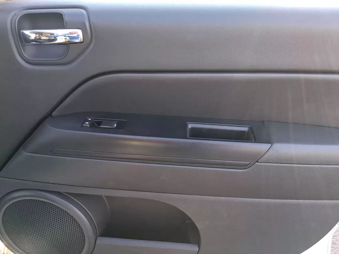 2012 Jeep Compass Latitude (1C4NJDEB4CD) with an 2.4L I-4 DOHC engine, Continuously Variable Transmission transmission, located at 8750 N County Rd 25A, Piqua, OH, 45356, (937) 908-9800, 40.164391, -84.232513 - Need a do-it-all SUV that fits real life in West Central Ohio-school drop-offs, long commutes up I75, and spontaneous weekend escapes to the trails around Johnston Farm and Indian Agency? This 2012 Jeep Compass Latitude 4WD in Bright White Clearcoat is built for that everyday adventure lifestyle, - Photo#17