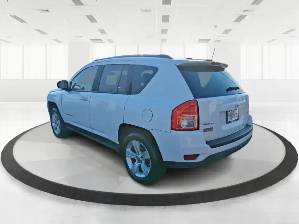 2012 Jeep Compass Latitude (1C4NJDEB4CD) with an 2.4L I-4 DOHC engine, Continuously Variable Transmission transmission, located at 4508 South Dixie Dr, Moraine, OH, 45439, (937) 908-9800, 39.689976, -84.218452 - Need a do-it-all SUV that fits real life in West Central Ohio-school drop-offs, long commutes up I75, and spontaneous weekend escapes to the trails around Johnston Farm and Indian Agency? This 2012 Jeep Compass Latitude 4WD in Bright White Clearcoat is built for that everyday adventure lifestyle, - Photo#4