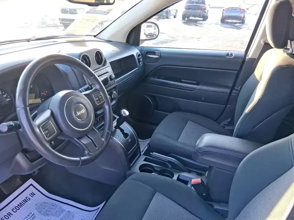 2012 Jeep Compass Latitude (1C4NJDEB4CD) with an 2.4L I-4 DOHC engine, Continuously Variable Transmission transmission, located at 4508 South Dixie Dr, Moraine, OH, 45439, (937) 908-9800, 39.689976, -84.218452 - Need a do-it-all SUV that fits real life in West Central Ohio-school drop-offs, long commutes up I75, and spontaneous weekend escapes to the trails around Johnston Farm and Indian Agency? This 2012 Jeep Compass Latitude 4WD in Bright White Clearcoat is built for that everyday adventure lifestyle, - Photo#8