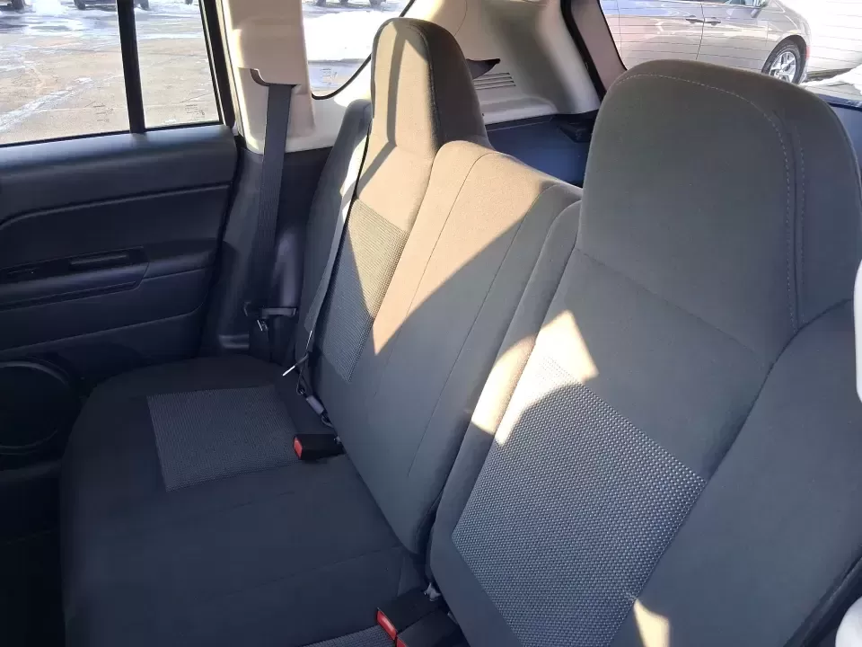 2012 Jeep Compass Latitude (1C4NJDEB4CD) with an 2.4L I-4 DOHC engine, Continuously Variable Transmission transmission, located at 4508 South Dixie Dr, Moraine, OH, 45439, (937) 908-9800, 39.689976, -84.218452 - Need a do-it-all SUV that fits real life in West Central Ohio-school drop-offs, long commutes up I75, and spontaneous weekend escapes to the trails around Johnston Farm and Indian Agency? This 2012 Jeep Compass Latitude 4WD in Bright White Clearcoat is built for that everyday adventure lifestyle, - Photo#9