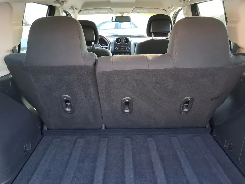 2012 Jeep Compass Latitude (1C4NJDEB4CD) with an 2.4L I-4 DOHC engine, Continuously Variable Transmission transmission, located at 4508 South Dixie Dr, Moraine, OH, 45439, (937) 908-9800, 39.689976, -84.218452 - Need a do-it-all SUV that fits real life in West Central Ohio-school drop-offs, long commutes up I75, and spontaneous weekend escapes to the trails around Johnston Farm and Indian Agency? This 2012 Jeep Compass Latitude 4WD in Bright White Clearcoat is built for that everyday adventure lifestyle, - Photo#11