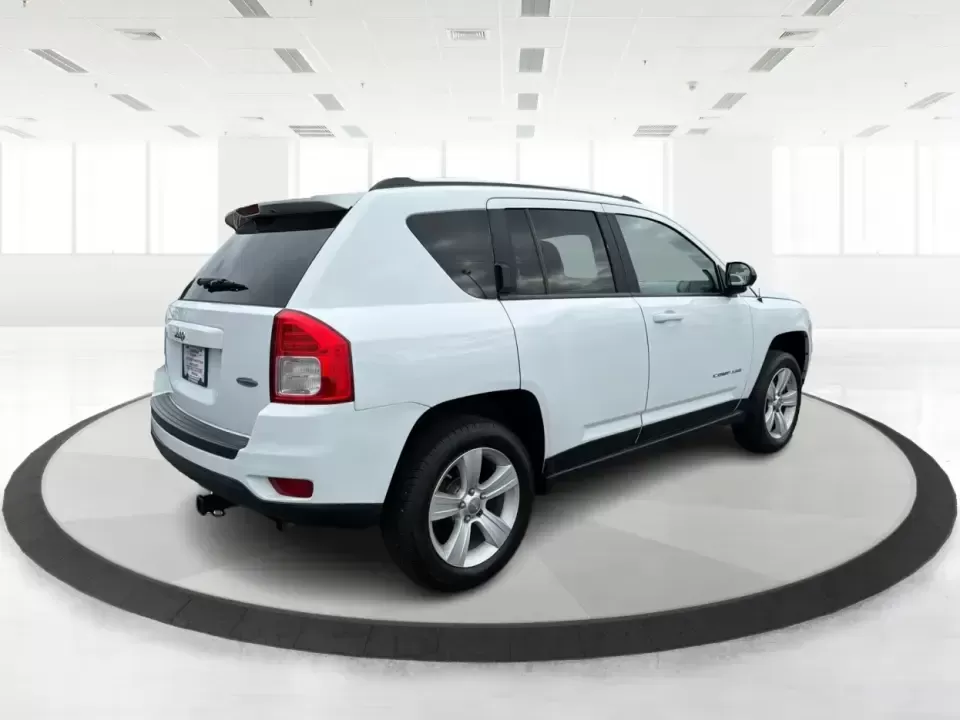 2012 Jeep Compass Latitude (1C4NJDEB4CD) with an 2.4L I-4 DOHC engine, Continuously Variable Transmission transmission, located at 1230 East Main St, Xenia, OH, 45385, (937) 908-9800, 39.688026, -83.910172 - Need a do-it-all SUV that fits real life in West Central Ohio-school drop-offs, long commutes up I75, and spontaneous weekend escapes to the trails around Johnston Farm and Indian Agency? This 2012 Jeep Compass Latitude 4WD in Bright White Clearcoat is built for that everyday adventure lifestyle, - Photo#2