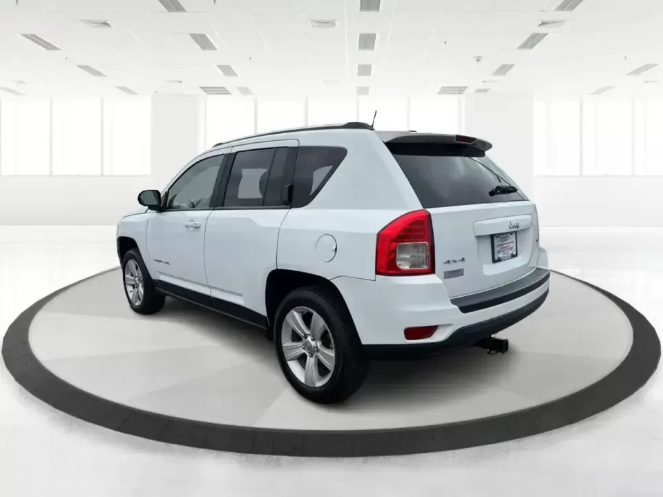 2012 Jeep Compass Latitude (1C4NJDEB4CD) with an 2.4L I-4 DOHC engine, Continuously Variable Transmission transmission, located at 1230 East Main St, Xenia, OH, 45385, (937) 908-9800, 39.688026, -83.910172 - Need a do-it-all SUV that fits real life in West Central Ohio-school drop-offs, long commutes up I75, and spontaneous weekend escapes to the trails around Johnston Farm and Indian Agency? This 2012 Jeep Compass Latitude 4WD in Bright White Clearcoat is built for that everyday adventure lifestyle, - Photo#4