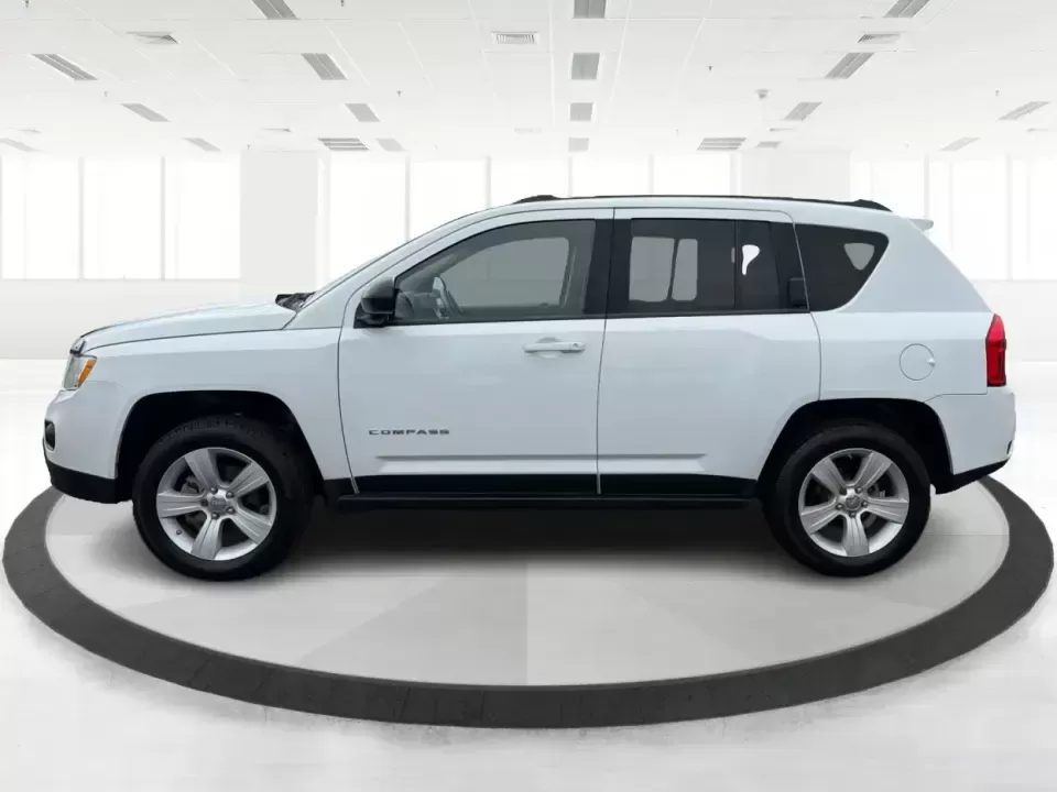 2012 Jeep Compass Latitude (1C4NJDEB4CD) with an 2.4L I-4 DOHC engine, Continuously Variable Transmission transmission, located at 1230 East Main St, Xenia, OH, 45385, (937) 908-9800, 39.688026, -83.910172 - Need a do-it-all SUV that fits real life in West Central Ohio-school drop-offs, long commutes up I75, and spontaneous weekend escapes to the trails around Johnston Farm and Indian Agency? This 2012 Jeep Compass Latitude 4WD in Bright White Clearcoat is built for that everyday adventure lifestyle, - Photo#5