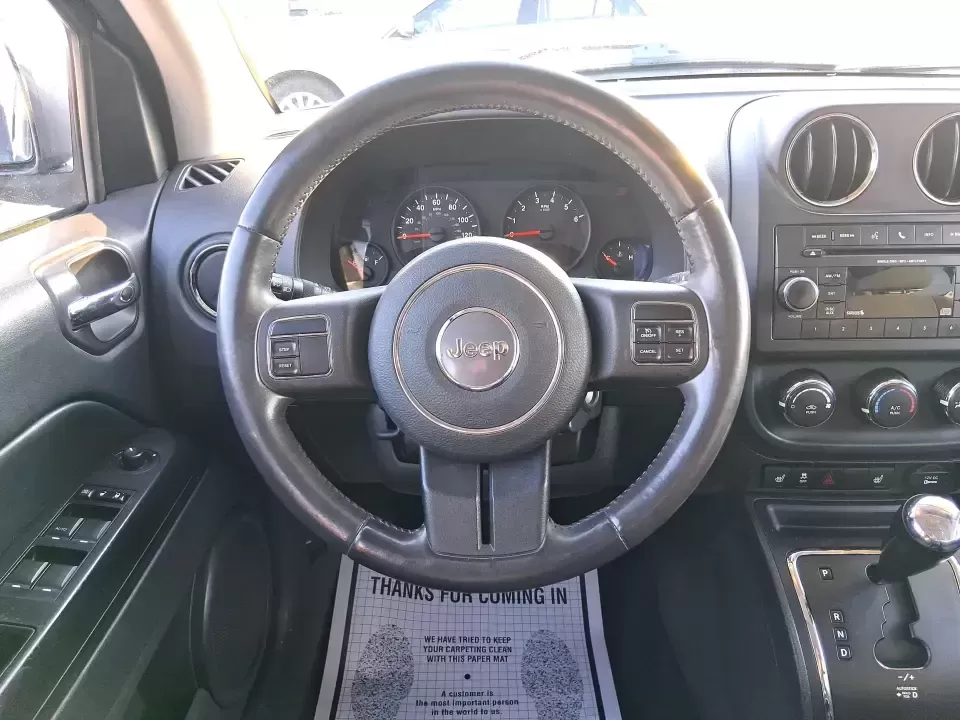 2012 Jeep Compass Latitude (1C4NJDEB4CD) with an 2.4L I-4 DOHC engine, Continuously Variable Transmission transmission, located at 1230 East Main St, Xenia, OH, 45385, (937) 908-9800, 39.688026, -83.910172 - Need a do-it-all SUV that fits real life in West Central Ohio-school drop-offs, long commutes up I75, and spontaneous weekend escapes to the trails around Johnston Farm and Indian Agency? This 2012 Jeep Compass Latitude 4WD in Bright White Clearcoat is built for that everyday adventure lifestyle, - Photo#16