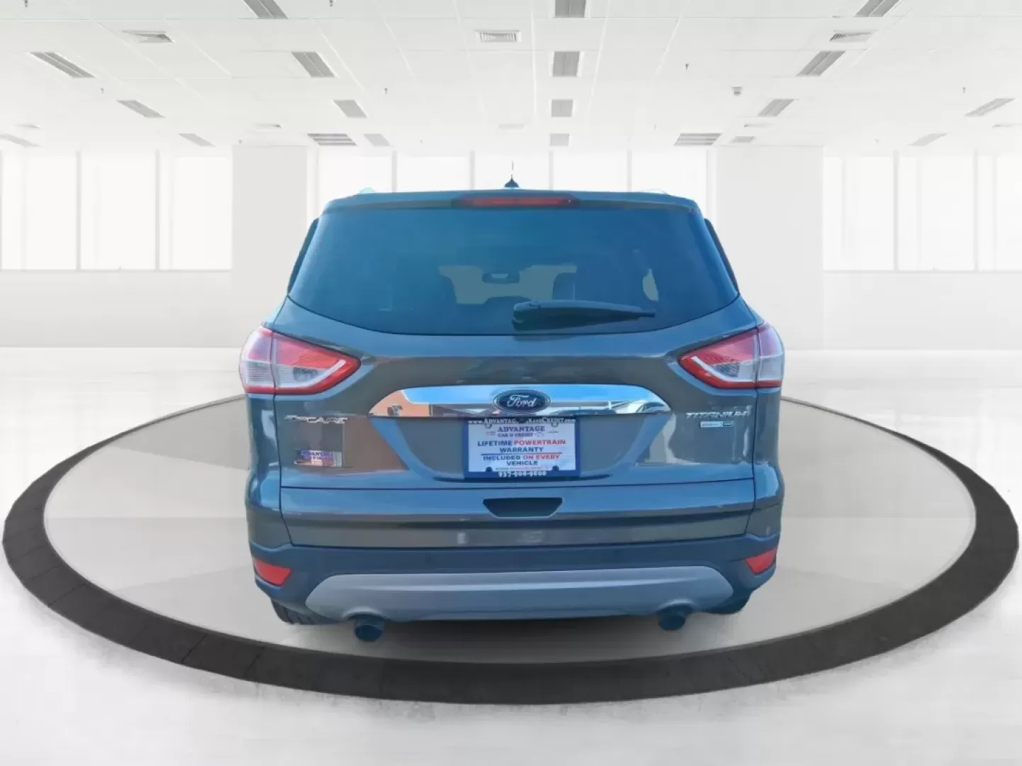 2016 Ford Escape Titanium (1FMCU9J94GU) with an 2.0L L4 DOHC 16V engine, 6-Speed Automatic transmission, located at 1951 S Dayton Lakeview Rd., New Carlisle, OH, 45344, (937) 908-9800, 39.890999, -84.050255 - Picture your next Ohio weekend: a quick grocery run through New Carlisle, a comfortable commute toward Dayton, and then a spontaneous road trip out I70 with the family-without worrying about weather, cargo space, or comfort. This 2016 Ford Escape Titanium in sleek Magnetic is the kind of compact SUV - Photo#3