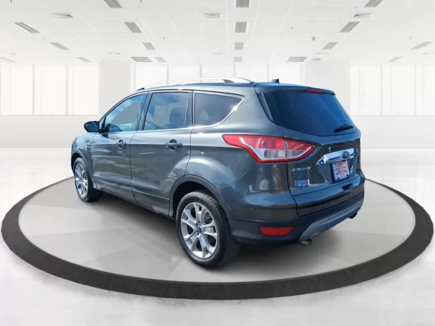 2016 Ford Escape Titanium (1FMCU9J94GU) with an 2.0L L4 DOHC 16V engine, 6-Speed Automatic transmission, located at 1951 S Dayton Lakeview Rd., New Carlisle, OH, 45344, (937) 908-9800, 39.890999, -84.050255 - Picture your next Ohio weekend: a quick grocery run through New Carlisle, a comfortable commute toward Dayton, and then a spontaneous road trip out I70 with the family-without worrying about weather, cargo space, or comfort. This 2016 Ford Escape Titanium in sleek Magnetic is the kind of compact SUV - Photo#4