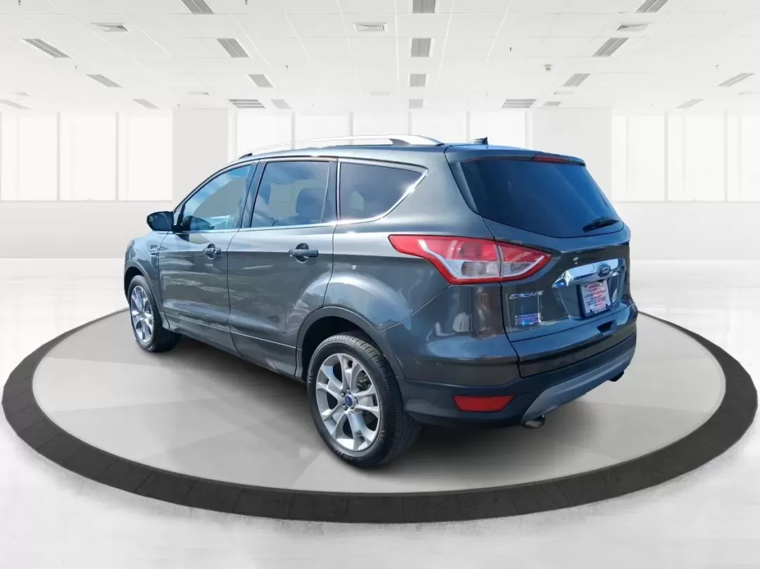 2016 Ford Escape Titanium (1FMCU9J94GU) with an 2.0L L4 DOHC 16V engine, 6-Speed Automatic transmission, located at 1951 S Dayton Lakeview Rd., New Carlisle, OH, 45344, (937) 908-9800, 39.890999, -84.050255 - Picture your next Ohio weekend: a quick grocery run through New Carlisle, a comfortable commute toward Dayton, and then a spontaneous road trip out I70 with the family-without worrying about weather, cargo space, or comfort. This 2016 Ford Escape Titanium in sleek Magnetic is the kind of compact SUV - Photo#4