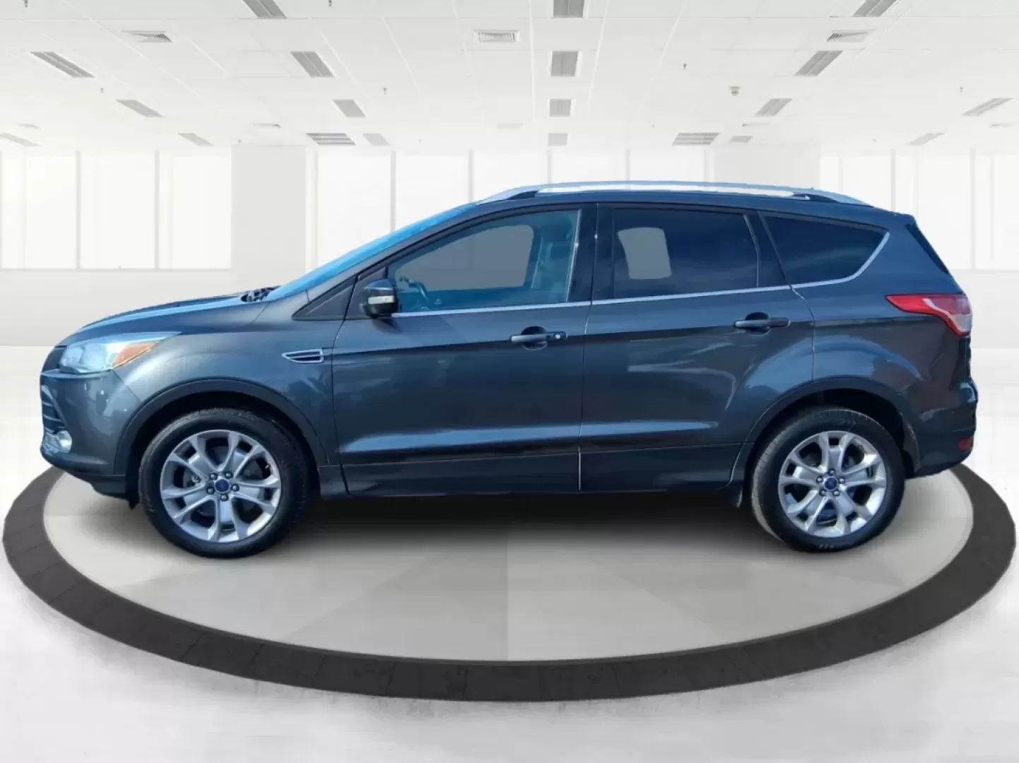 2016 Ford Escape Titanium (1FMCU9J94GU) with an 2.0L L4 DOHC 16V engine, 6-Speed Automatic transmission, located at 1951 S Dayton Lakeview Rd., New Carlisle, OH, 45344, (937) 908-9800, 39.890999, -84.050255 - Picture your next Ohio weekend: a quick grocery run through New Carlisle, a comfortable commute toward Dayton, and then a spontaneous road trip out I70 with the family-without worrying about weather, cargo space, or comfort. This 2016 Ford Escape Titanium in sleek Magnetic is the kind of compact SUV - Photo#5