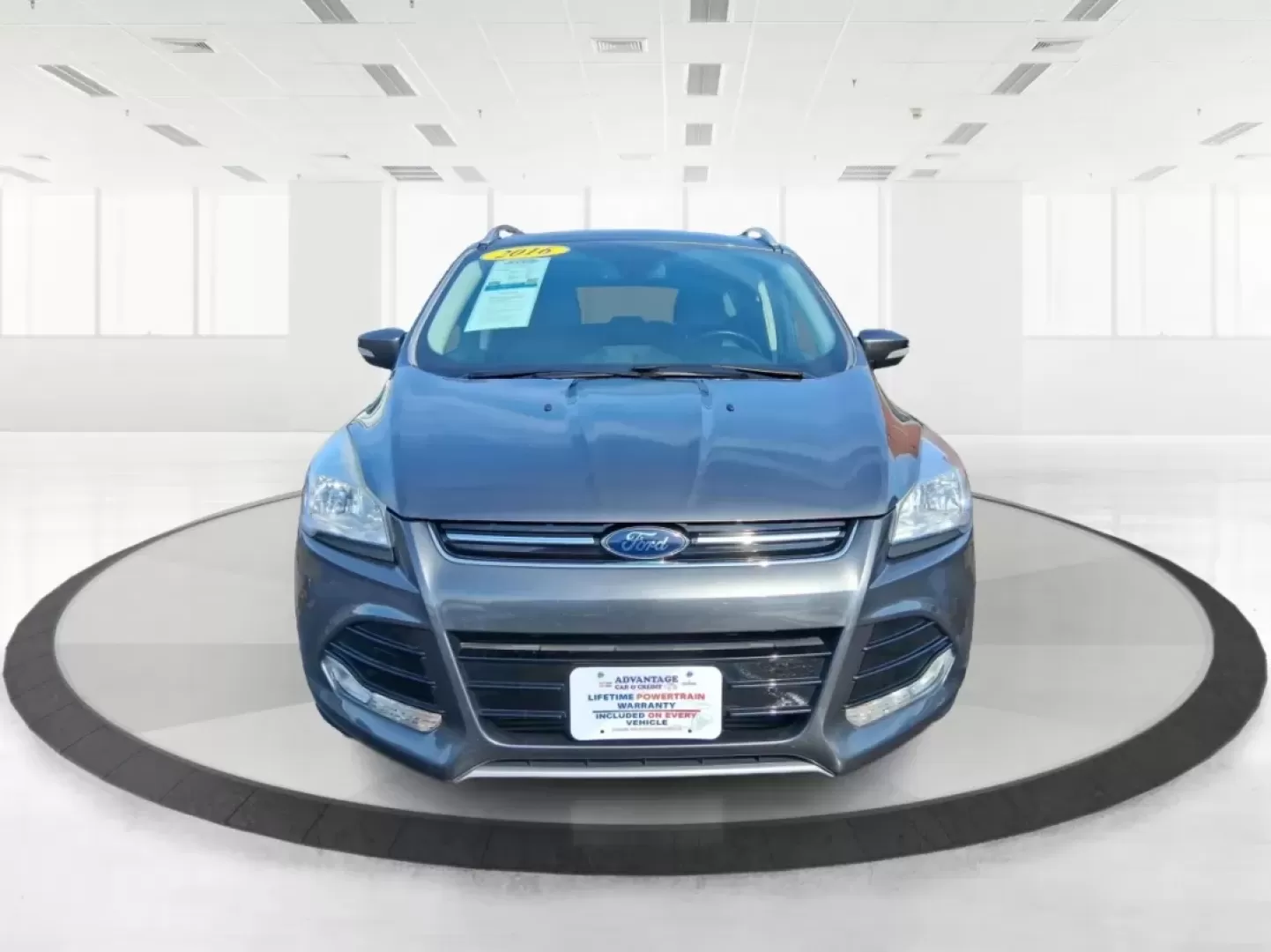 2016 Ford Escape Titanium (1FMCU9J94GU) with an 2.0L L4 DOHC 16V engine, 6-Speed Automatic transmission, located at 1951 S Dayton Lakeview Rd., New Carlisle, OH, 45344, (937) 908-9800, 39.890999, -84.050255 - Picture your next Ohio weekend: a quick grocery run through New Carlisle, a comfortable commute toward Dayton, and then a spontaneous road trip out I70 with the family-without worrying about weather, cargo space, or comfort. This 2016 Ford Escape Titanium in sleek Magnetic is the kind of compact SUV - Photo#7