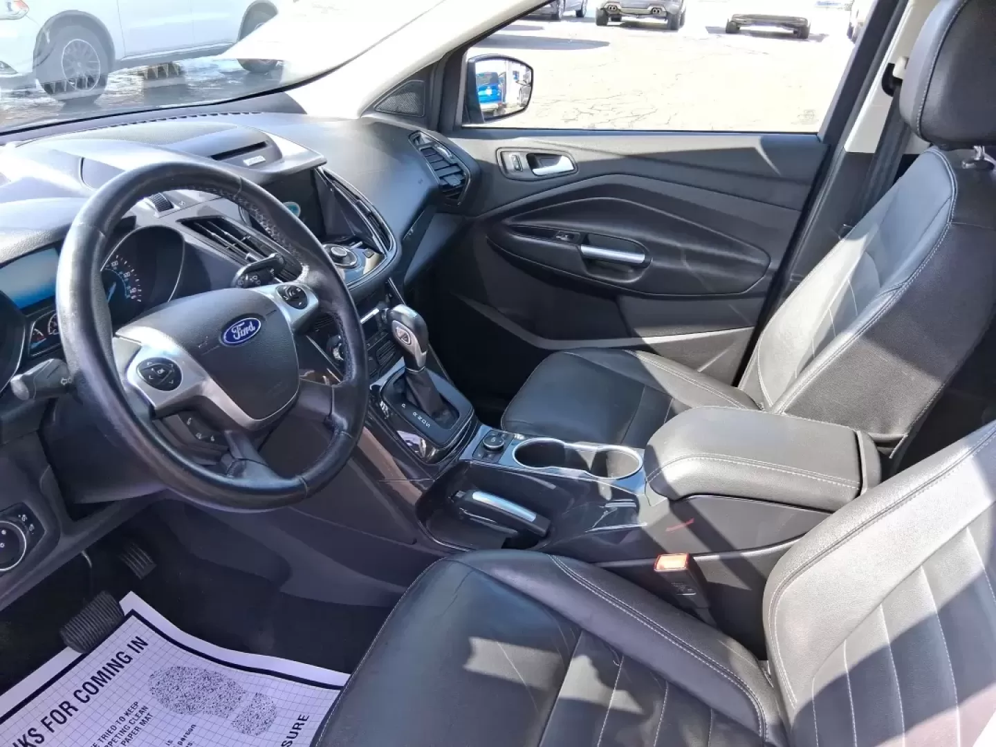 2016 Ford Escape Titanium (1FMCU9J94GU) with an 2.0L L4 DOHC 16V engine, 6-Speed Automatic transmission, located at 1951 S Dayton Lakeview Rd., New Carlisle, OH, 45344, (937) 908-9800, 39.890999, -84.050255 - Picture your next Ohio weekend: a quick grocery run through New Carlisle, a comfortable commute toward Dayton, and then a spontaneous road trip out I70 with the family-without worrying about weather, cargo space, or comfort. This 2016 Ford Escape Titanium in sleek Magnetic is the kind of compact SUV - Photo#9