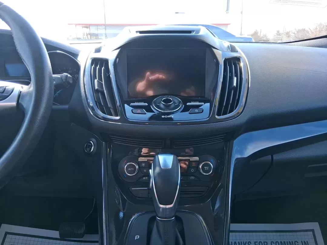 2016 Ford Escape Titanium (1FMCU9J94GU) with an 2.0L L4 DOHC 16V engine, 6-Speed Automatic transmission, located at 1951 S Dayton Lakeview Rd., New Carlisle, OH, 45344, (937) 908-9800, 39.890999, -84.050255 - Picture your next Ohio weekend: a quick grocery run through New Carlisle, a comfortable commute toward Dayton, and then a spontaneous road trip out I70 with the family-without worrying about weather, cargo space, or comfort. This 2016 Ford Escape Titanium in sleek Magnetic is the kind of compact SUV - Photo#13