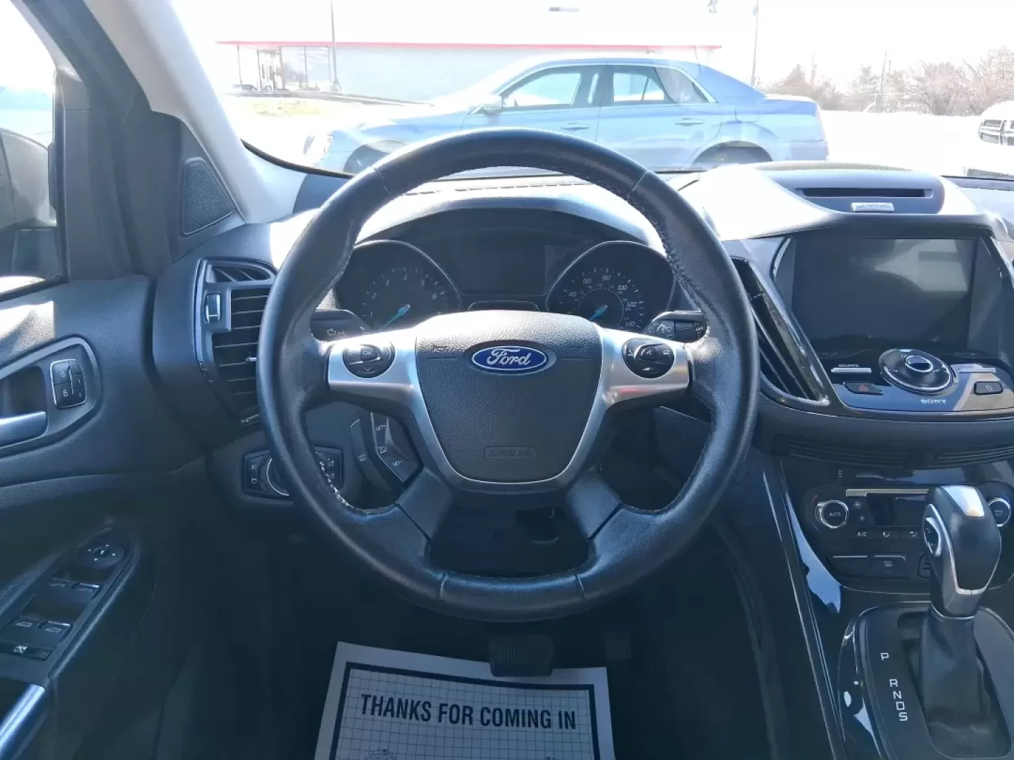 2016 Ford Escape Titanium (1FMCU9J94GU) with an 2.0L L4 DOHC 16V engine, 6-Speed Automatic transmission, located at 1951 S Dayton Lakeview Rd., New Carlisle, OH, 45344, (937) 908-9800, 39.890999, -84.050255 - Picture your next Ohio weekend: a quick grocery run through New Carlisle, a comfortable commute toward Dayton, and then a spontaneous road trip out I70 with the family-without worrying about weather, cargo space, or comfort. This 2016 Ford Escape Titanium in sleek Magnetic is the kind of compact SUV - Photo#16