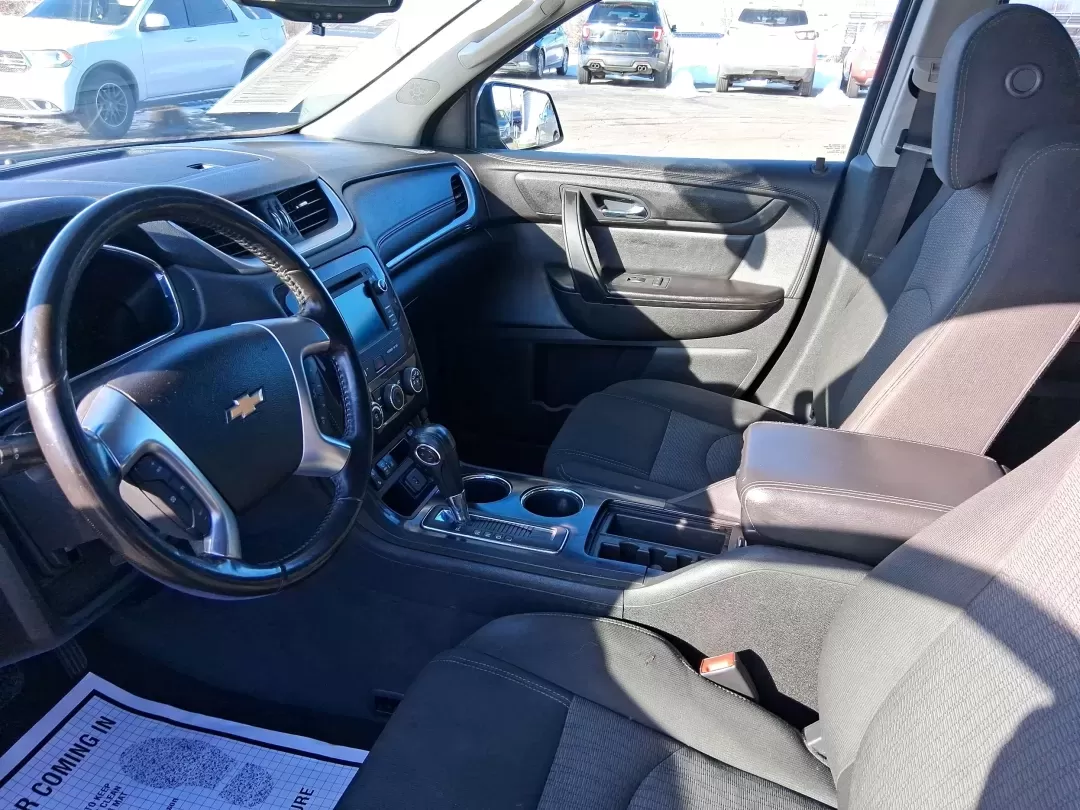 2017 Chevrolet Traverse 1LT (1GNKRGKDXHJ) with an 3.6L V-6 gasoline direct injection engine, 6A transmission, located at 8750 N County Rd 25A, Piqua, OH, 45356, (937) 908-9800, 40.164391, -84.232513 - Picture your next weekend: the kids are loaded up, the playlist is set, and you're cruising from Piqua to a ballgame, a family cookout, or a day trip to Indian Lake without worrying about space, comfort, or reliability. This 2017 Chevrolet Traverse 1LT is the kind of three-row SUV that fits real lif - Photo#8