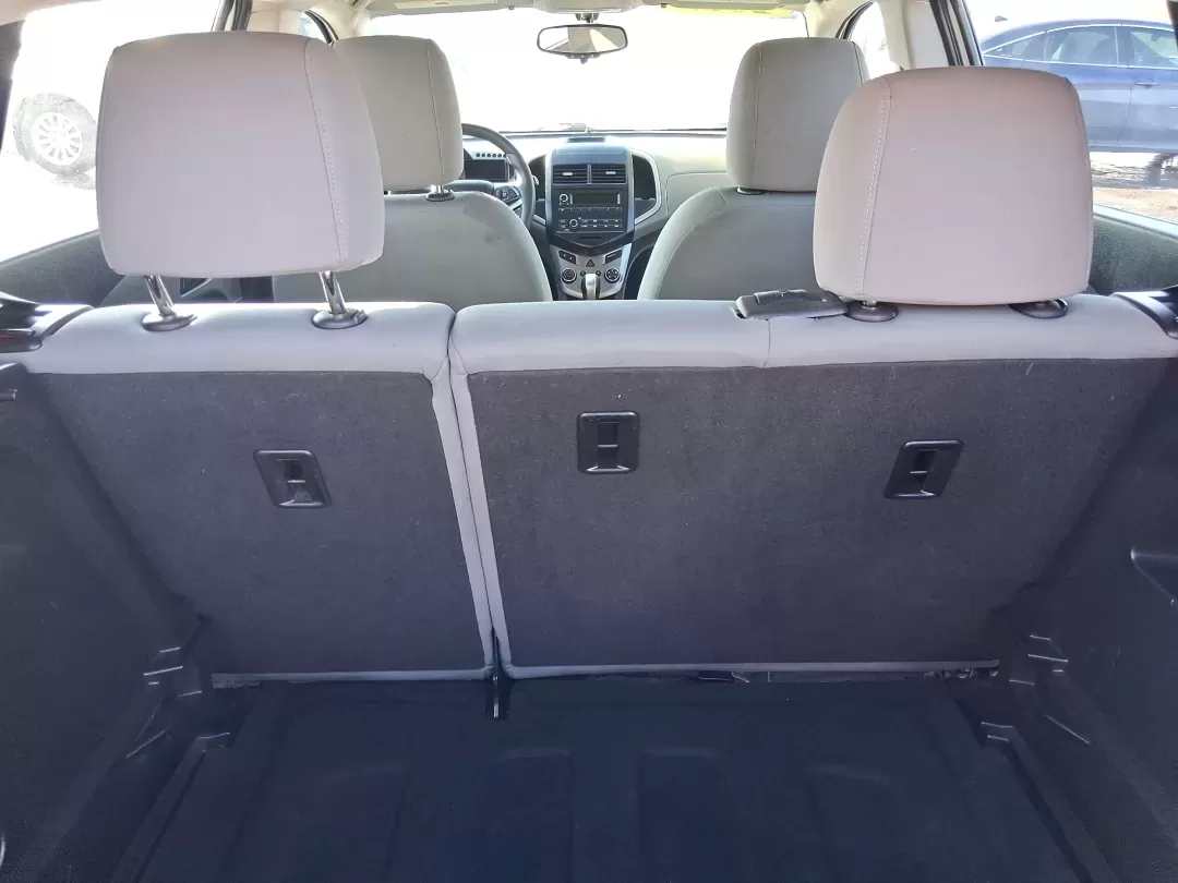 2016 Chevrolet Sonic LS Auto (1G1JA6SH4G4) with an 1.8L L4 DOHC 24V engine, 6A transmission, located at 1184 Kauffman Ave, Fairborn, OH, 45324, (937) 908-9800, 39.807072, -84.030914 - Need a smart, easy-to-park commuter that can also handle grocery runs, campus life, and weekend getaways without draining your budget? This 2016 Chevrolet Sonic LS Auto Hatchback is built for real-life Fairborn living-zipping down I675 for work, cruising over to Wright-Patterson Air Force Base, or h - Photo#11