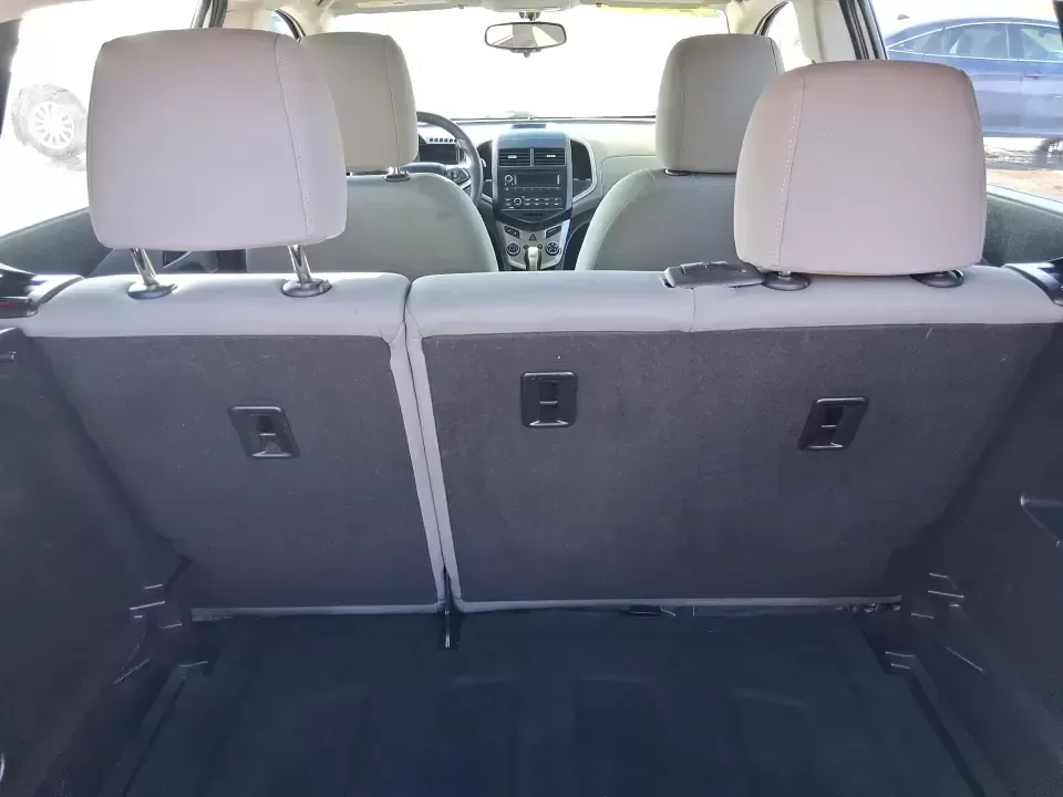 2016 Chevrolet Sonic LS Auto (1G1JA6SH4G4) with an 1.8L L4 DOHC 24V engine, 6A transmission, located at 1230 East Main St, Xenia, OH, 45385, (937) 908-9800, 39.688026, -83.910172 - Need a smart, easy-to-park commuter that can also handle grocery runs, campus life, and weekend getaways without draining your budget? This 2016 Chevrolet Sonic LS Auto Hatchback is built for real-life Fairborn living-zipping down I675 for work, cruising over to Wright-Patterson Air Force Base, or h - Photo#11