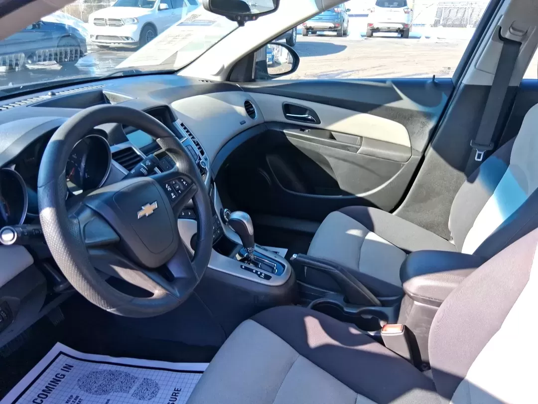 2014 Chevrolet Cruze LS Auto (1G1PA5SH3E7) with an ECOTEC 1.8L I-4 DOHC engine, 6-Speed Automatic transmission, located at 4508 South Dixie Dr, Moraine, OH, 45439, (937) 908-9800, 39.689976, -84.218452 - Need a smart, budget-friendly commuter that can handle daily school drop-offs, I-75 traffic, and weekend errands without draining your wallet at the pump? This 2014 Chevrolet Cruze LS Auto is a practical, easy-to-live-with sedan that fits real Moraine lifestyles-whether you're commuting toward Downt - Photo#9