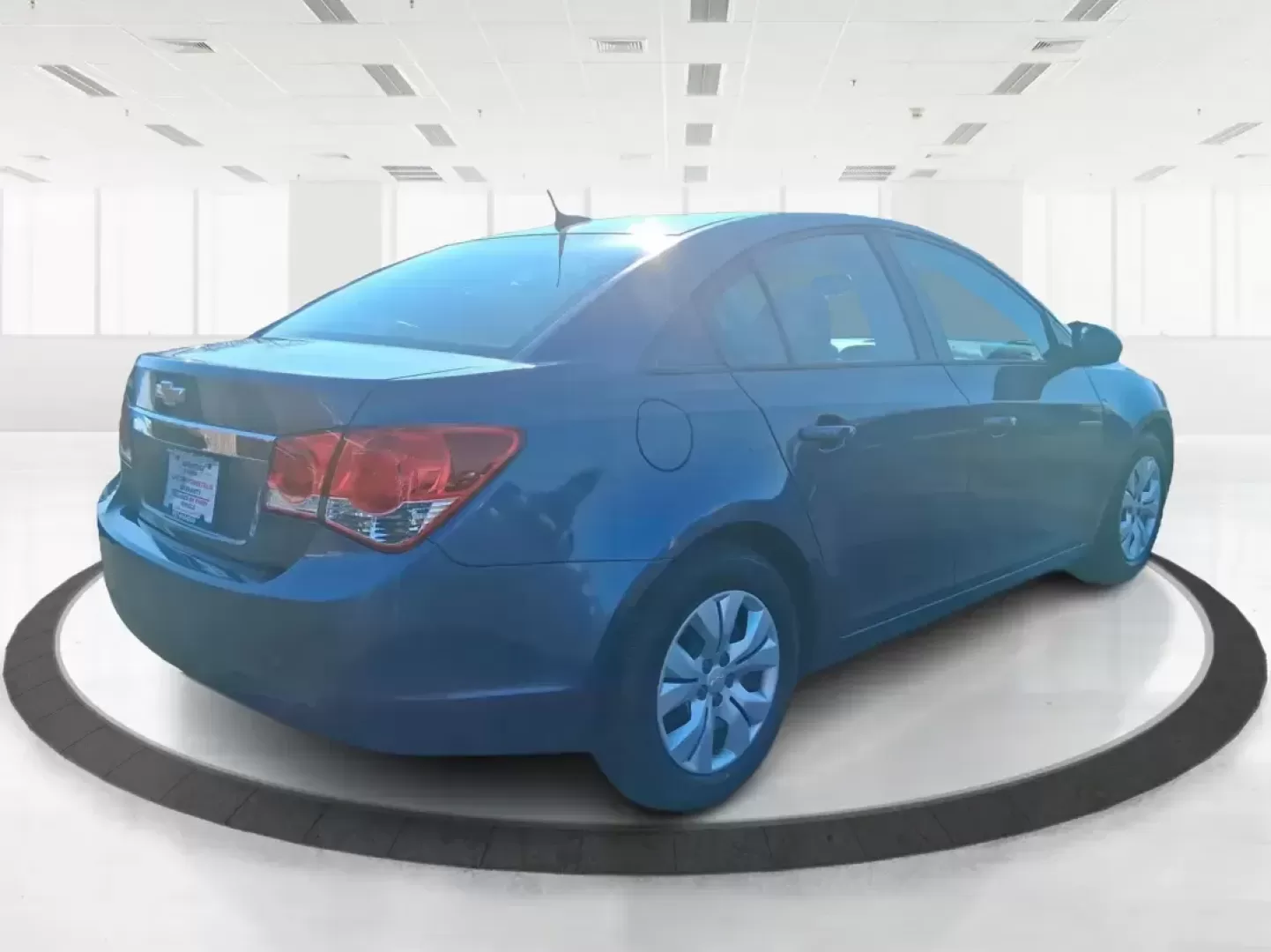 2014 Chevrolet Cruze LS Auto (1G1PA5SH3E7) with an ECOTEC 1.8L I-4 DOHC engine, 6-Speed Automatic transmission, located at 1951 S Dayton Lakeview Rd., New Carlisle, OH, 45344, (937) 908-9800, 39.890999, -84.050255 - Need a smart, budget-friendly commuter that can handle daily school drop-offs, I-75 traffic, and weekend errands without draining your wallet at the pump? This 2014 Chevrolet Cruze LS Auto is a practical, easy-to-live-with sedan that fits real Moraine lifestyles-whether you're commuting toward Downt - Photo#2