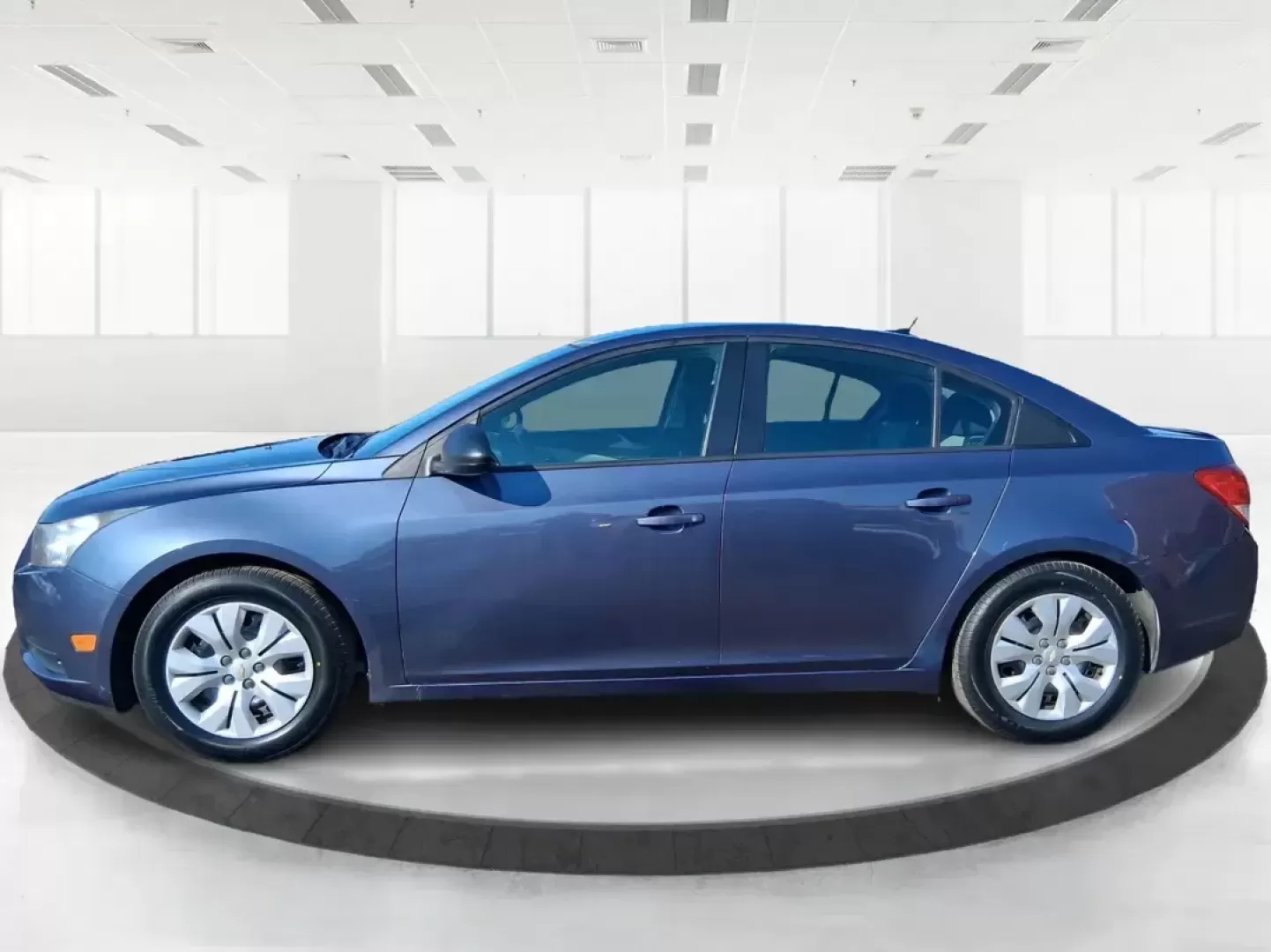 2014 Chevrolet Cruze LS Auto (1G1PA5SH3E7) with an ECOTEC 1.8L I-4 DOHC engine, 6-Speed Automatic transmission, located at 1951 S Dayton Lakeview Rd., New Carlisle, OH, 45344, (937) 908-9800, 39.890999, -84.050255 - Need a smart, budget-friendly commuter that can handle daily school drop-offs, I-75 traffic, and weekend errands without draining your wallet at the pump? This 2014 Chevrolet Cruze LS Auto is a practical, easy-to-live-with sedan that fits real Moraine lifestyles-whether you're commuting toward Downt - Photo#5